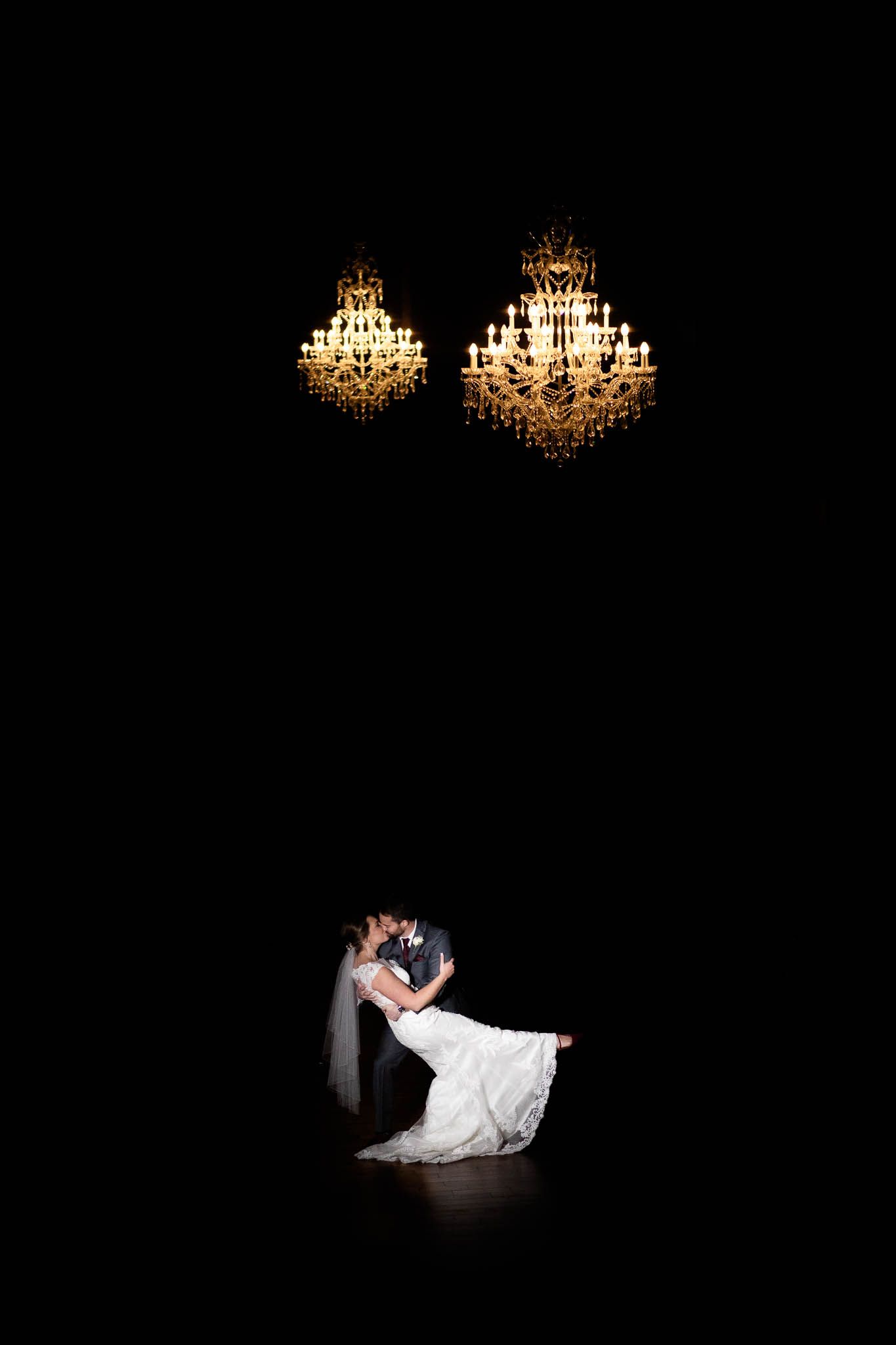 A dramatic wedding dance silhouette sequence under elegant chandeliers shows a couple moving through romantic poses.