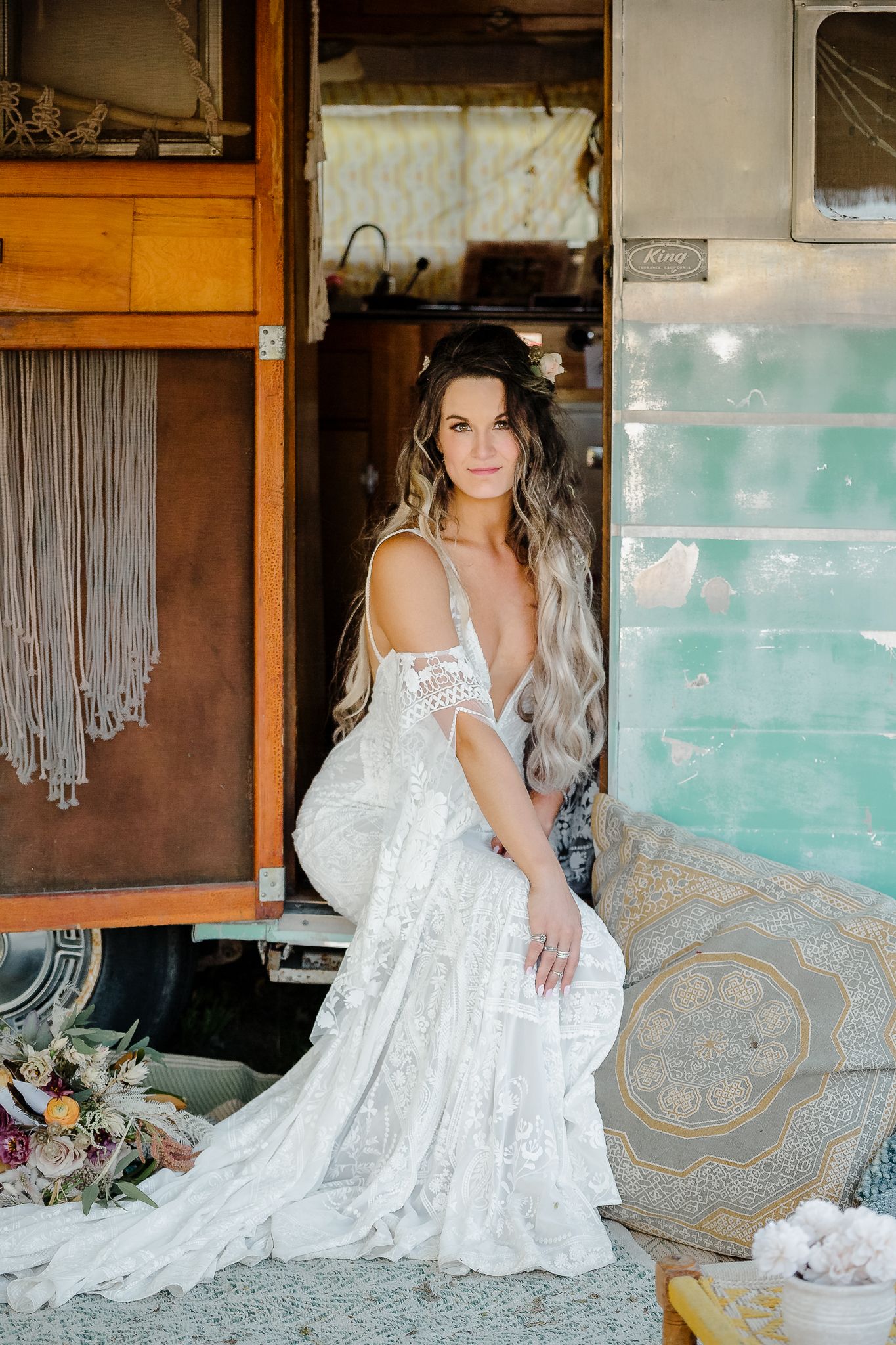 Bridal portraits in a vintage setting featuring lace wedding dress details.