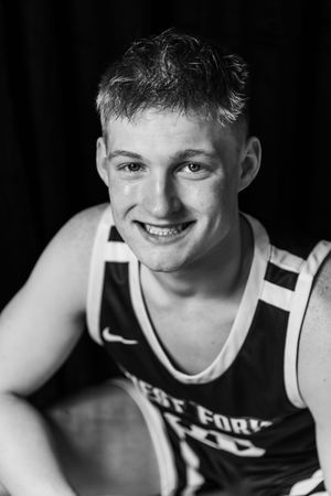 Black and white sports portrait series in basketball jersey.
