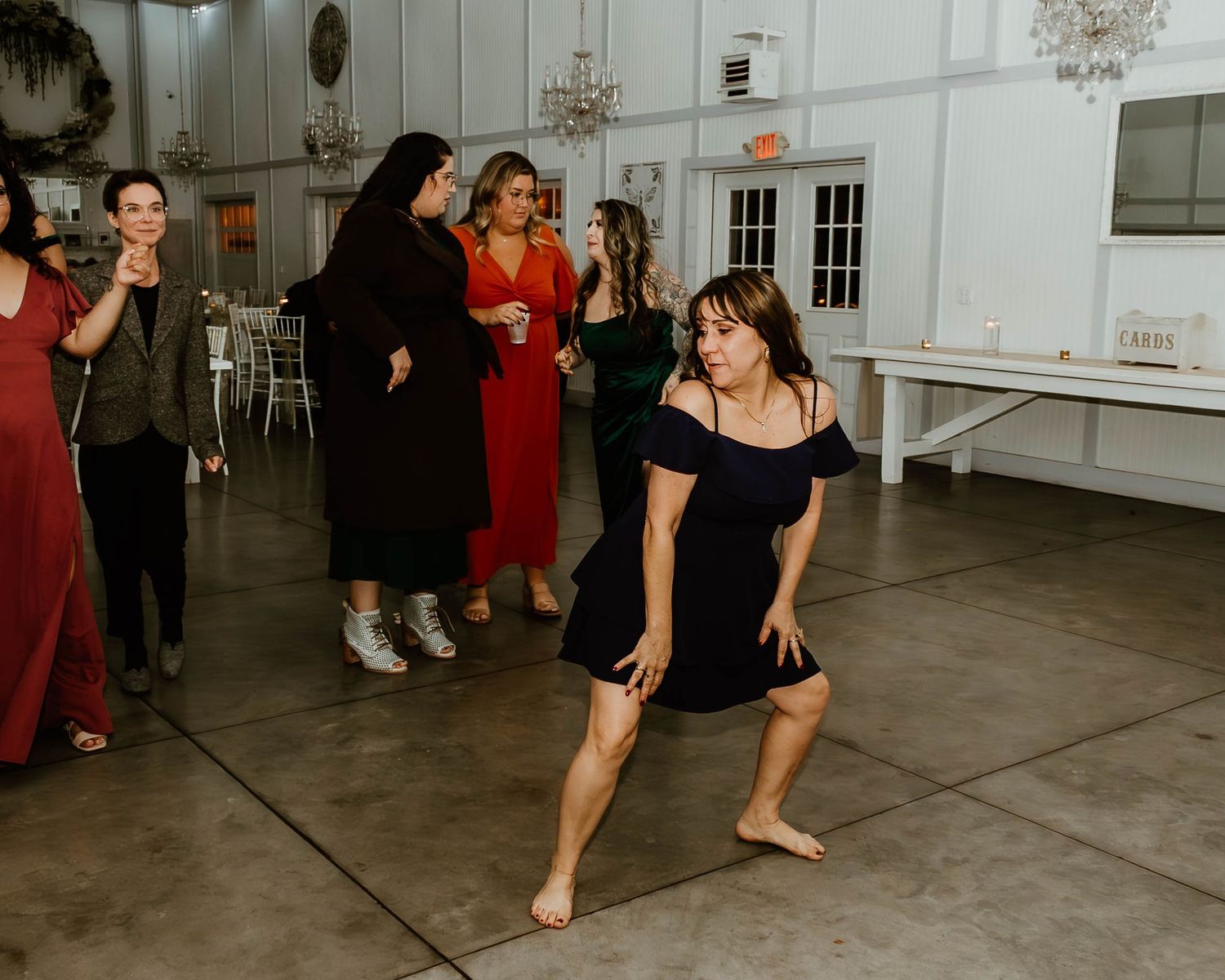 Fun candid wedding reception photos of guests laughing and dancing — Florida documentary wedding photography. Saxon Manor wedding venue