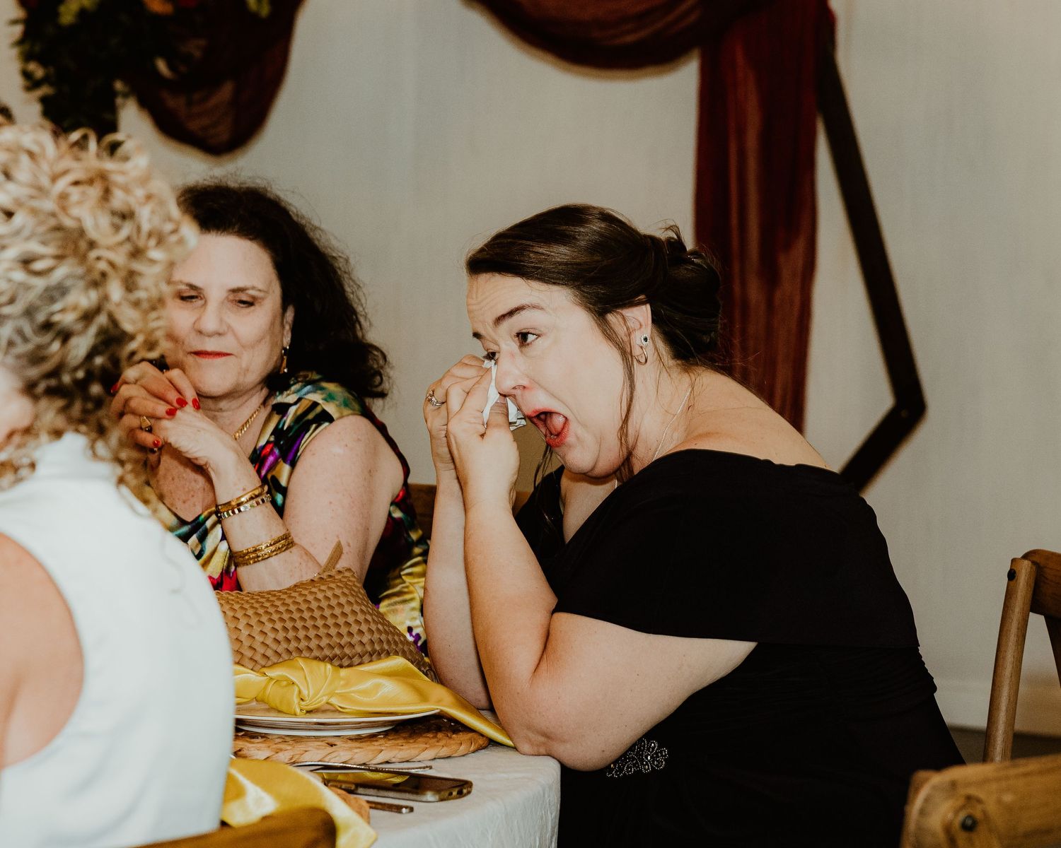 mom crying watching daddy daughter dance. good wedding photographers in Florida. emotional wedding photos. Florida wedding lithia acres