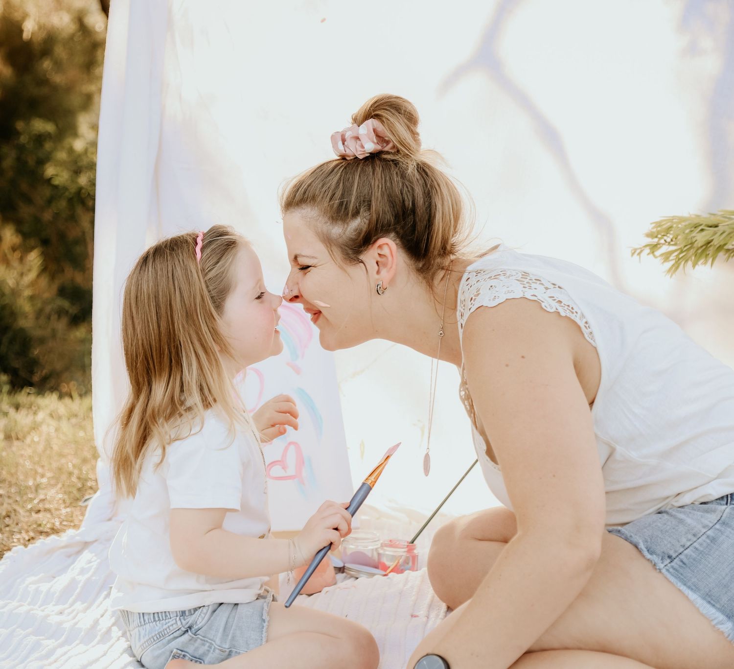 Always time for a smooch, even during a Paint with me session.