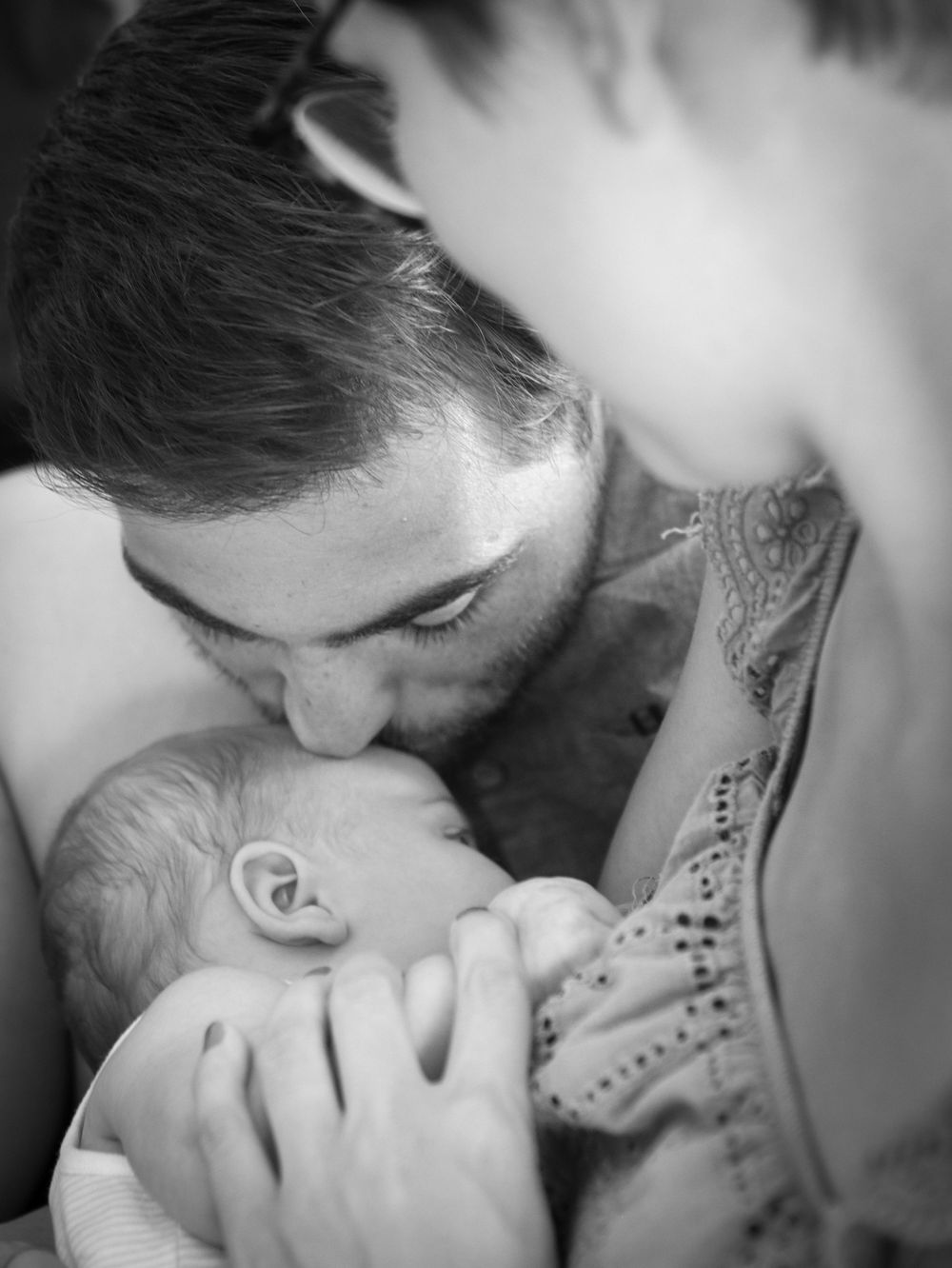 Intimate black and white close-up portrait showing tender affection.