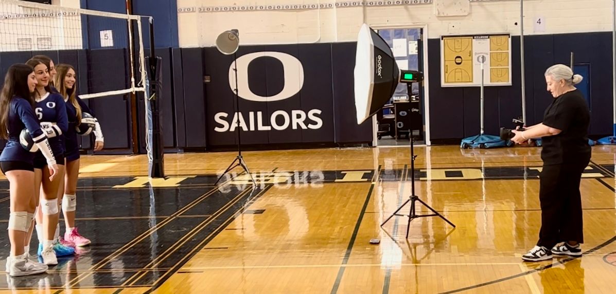 Behind the senes of high school sports media day in Oceanside, NY. Showing dynamic lighting set up that is brought in on media day in NY.