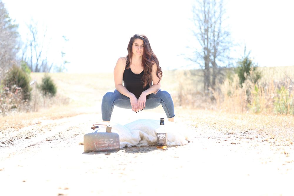 Trash and burn the wedding dress for a my divorce is final photoshoot. Getting closure to move on.