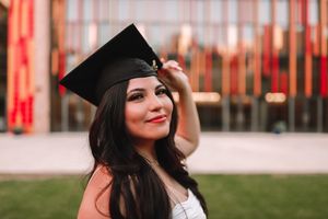 Graduation portrait with cap and gown