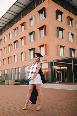 Graduation portrait with cap and gown