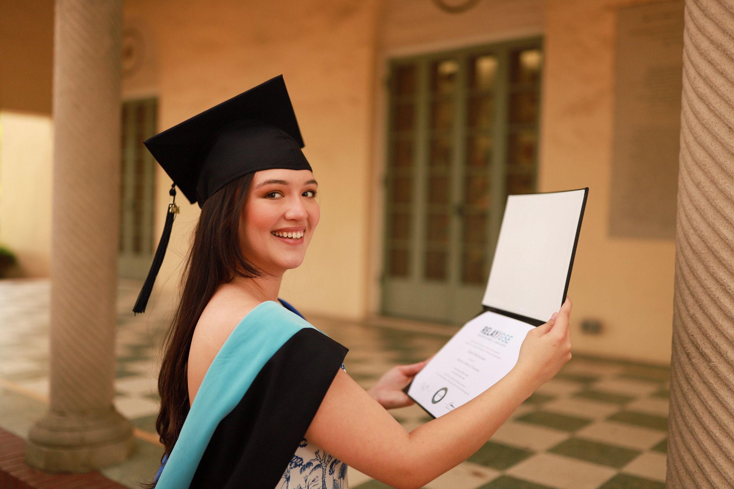 Graduation portrait with cap and gown