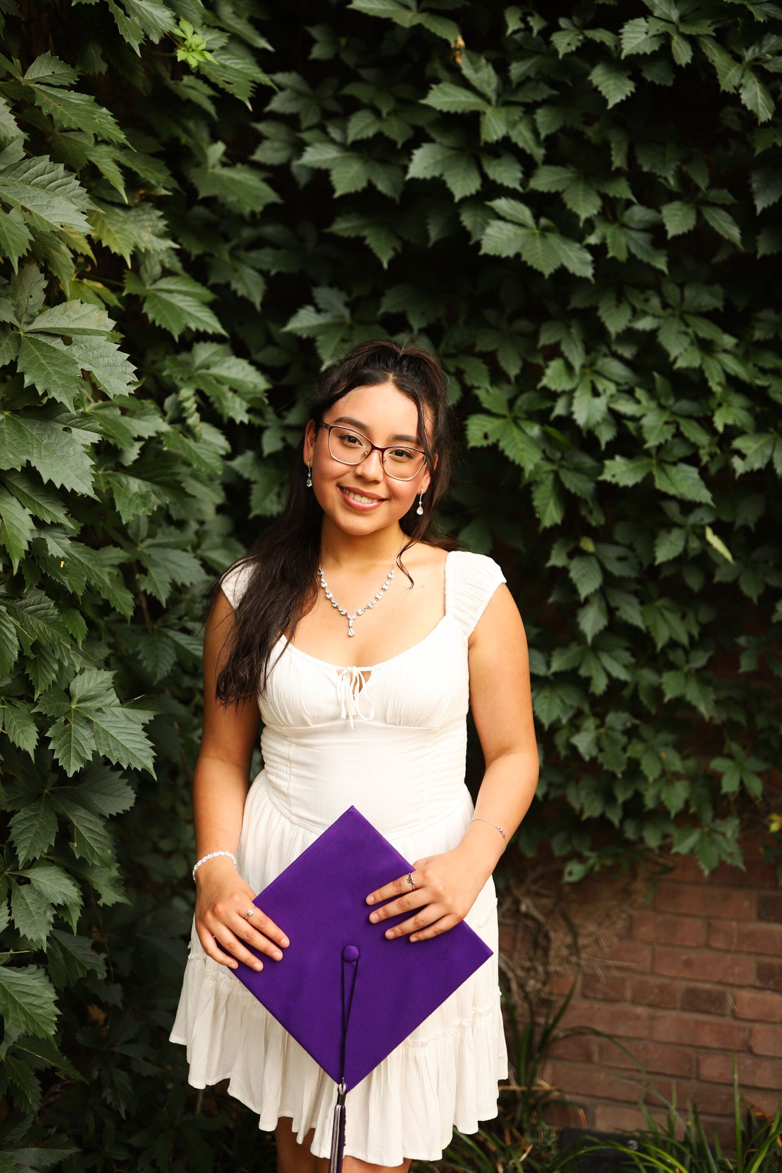 Graduation portrait with cap and gown