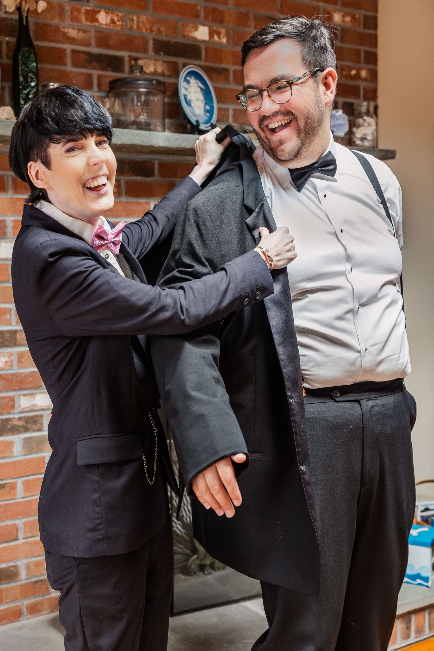 A playful sequence of formal wedding party photos showing joyful interactions against a brick wall background.