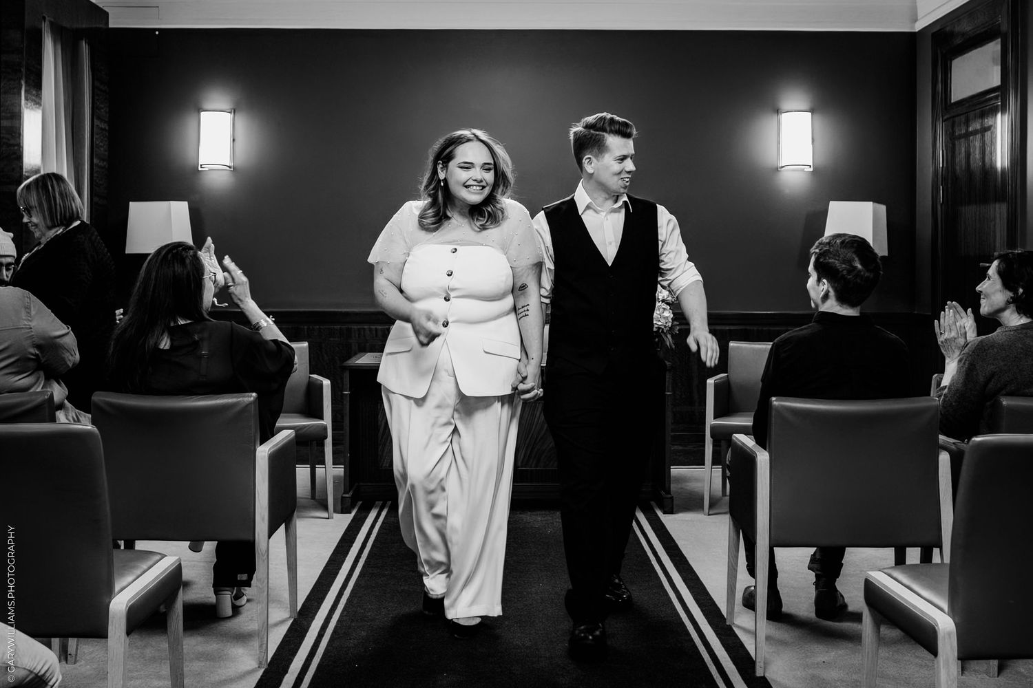 A black and white panoramic collage showing multiple couples dancing at what appears to be a formal event or dance class.