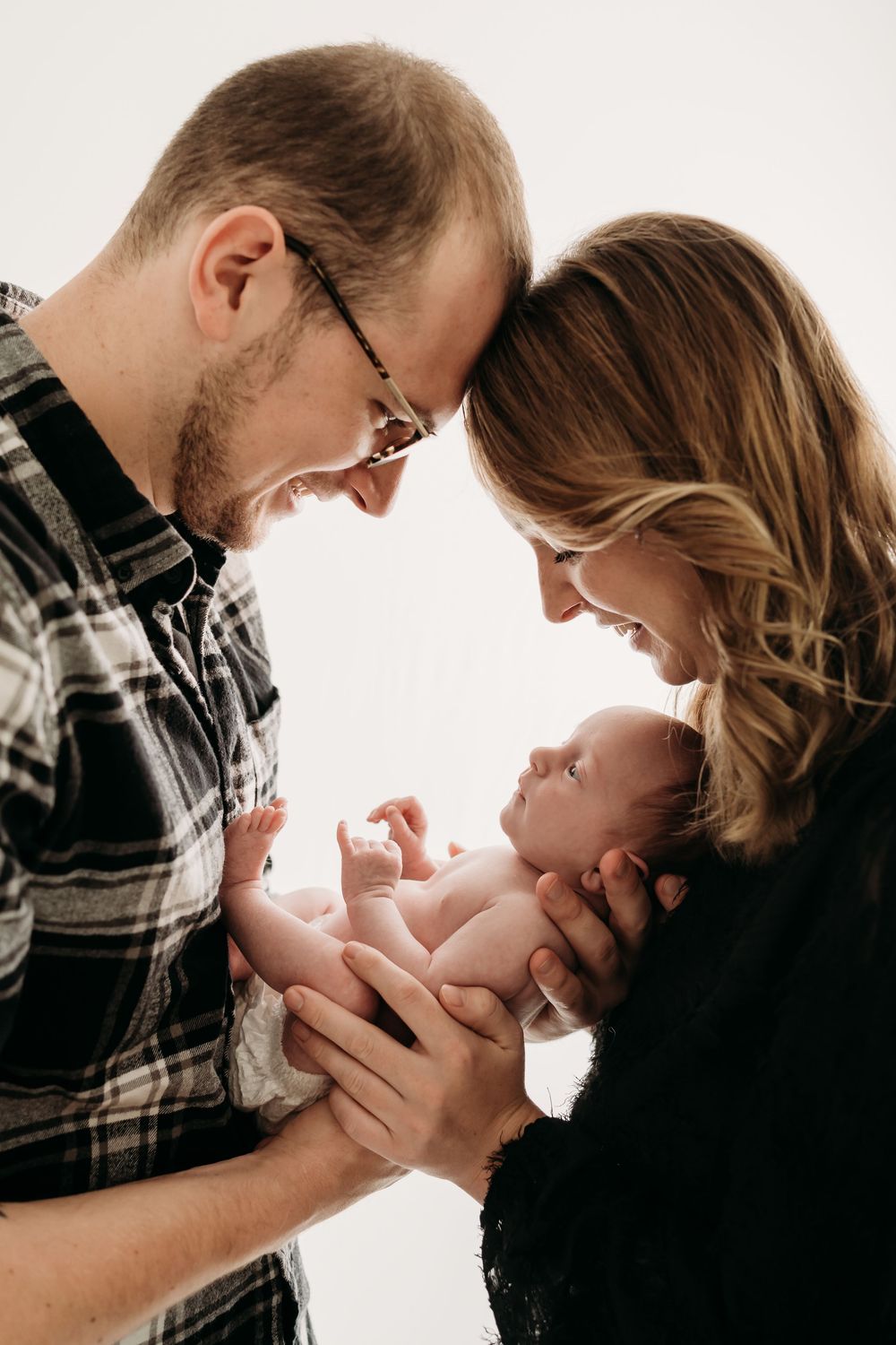 newborn shoot met papa en mama