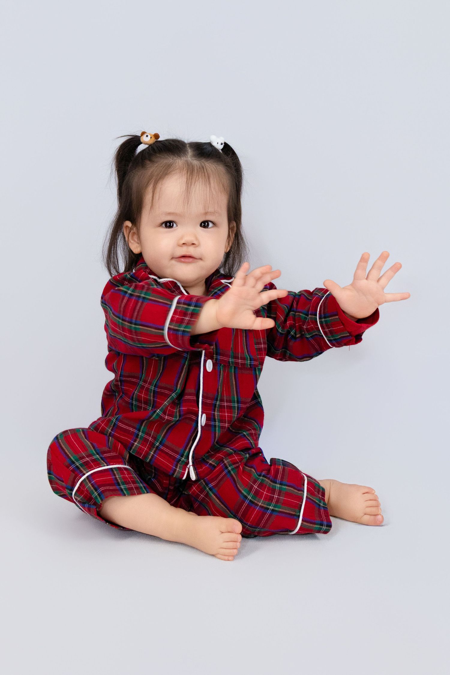 Festive holiday Pjs, holiday cheer, tinsel and lots of red and greens, our Christmas holiday shoot is here!