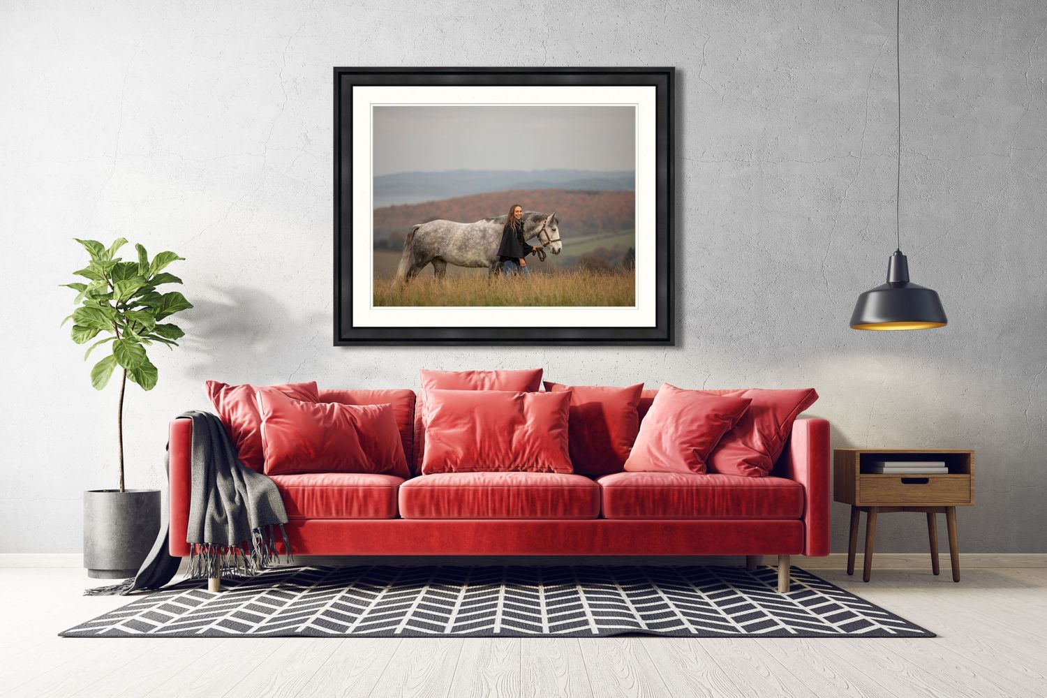 A pinto horse adorned with flowers stands in a golden summer meadow with someone in a blue dress at sunset.