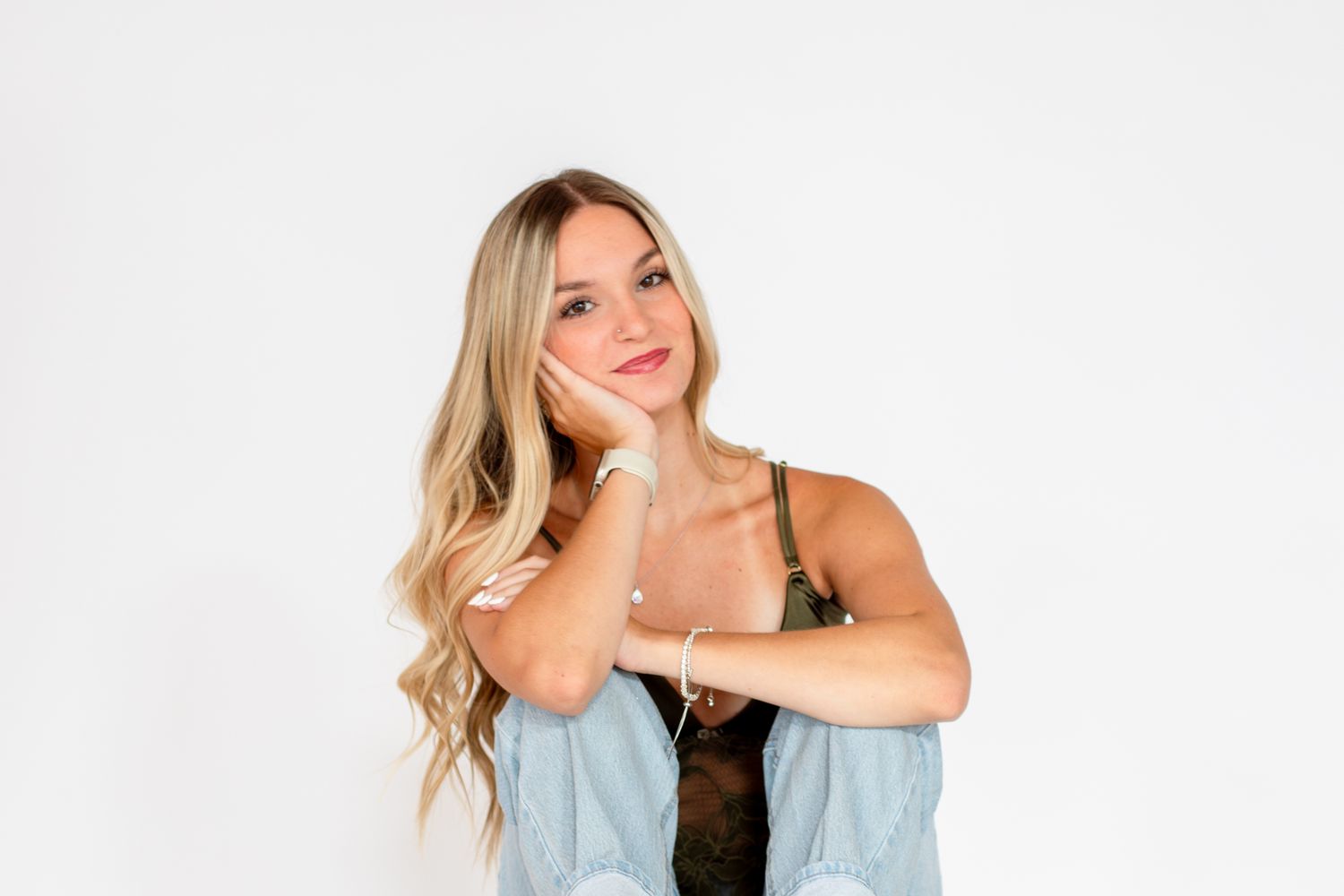 Senior photo of teen in Cincinnati studio with professional lighting and polished styling for high-end portrait clients