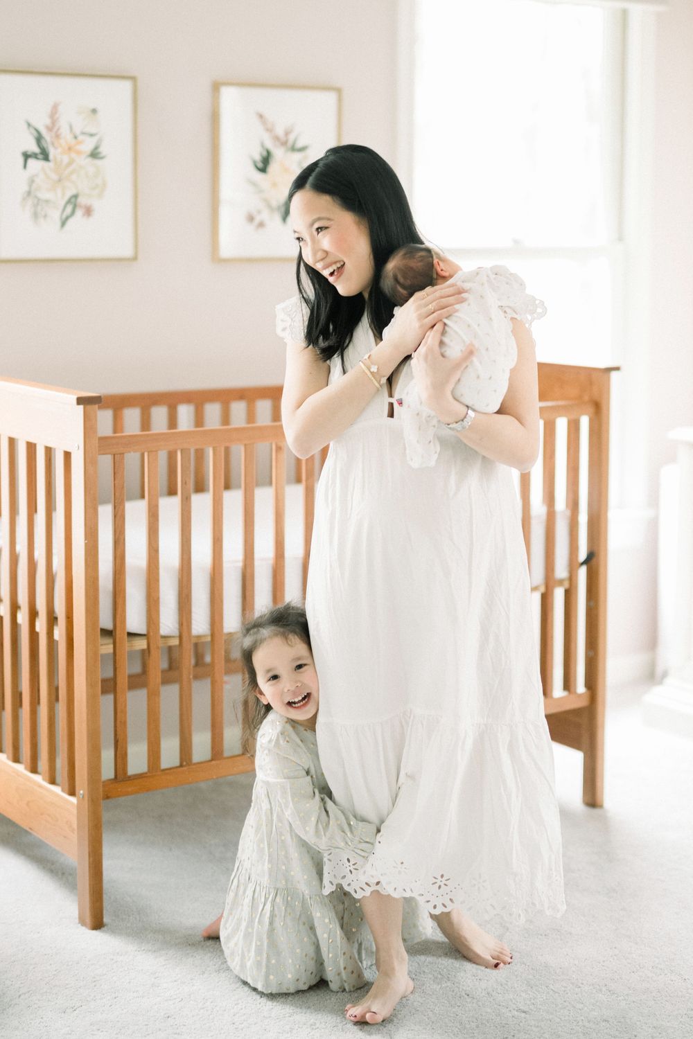 A candid series of playful moments between parent and child wearing white dresses in a bright sunlit room.