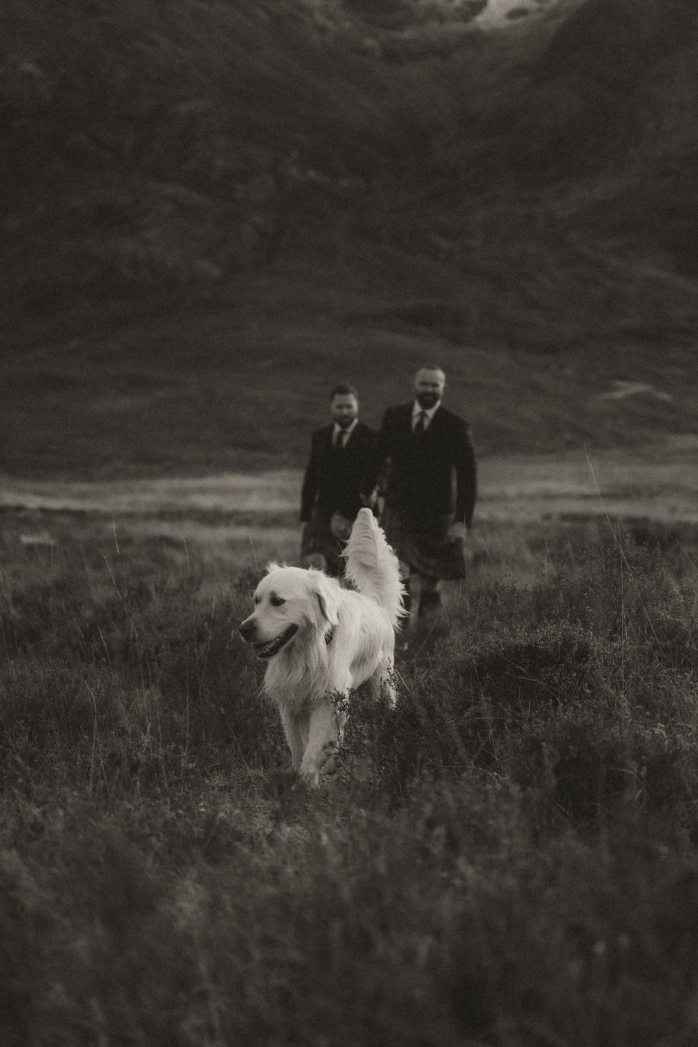Intimate elopement ceremony in a remote landscape, captured naturally with a documentary approach