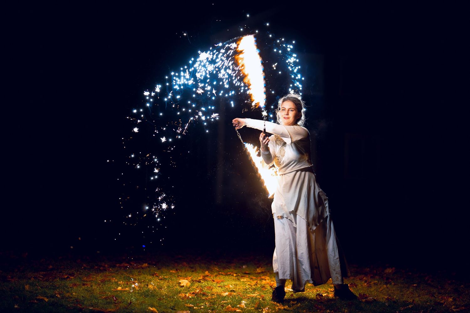 Dramatic fire performance captured in motion, ideal for event marketing, festival promotions, and entertainment branding.