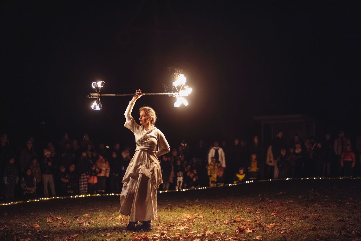 Dynamic shot of a live cultural performance at night, highlighting vibrant atmosphere. Perfect for event marketing and promotional materials