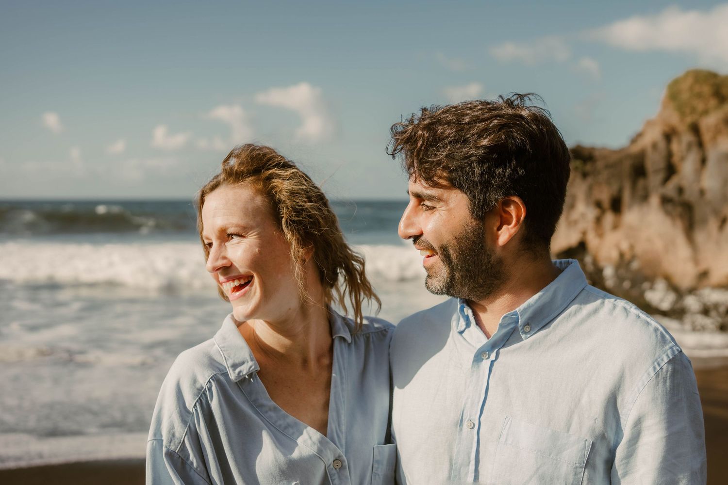 A romantic couples photoshoot at Playa del Roque de las Bodegas, Tenerife, Canary Islands. Capturing love amidst the rugged coastal beauty.
