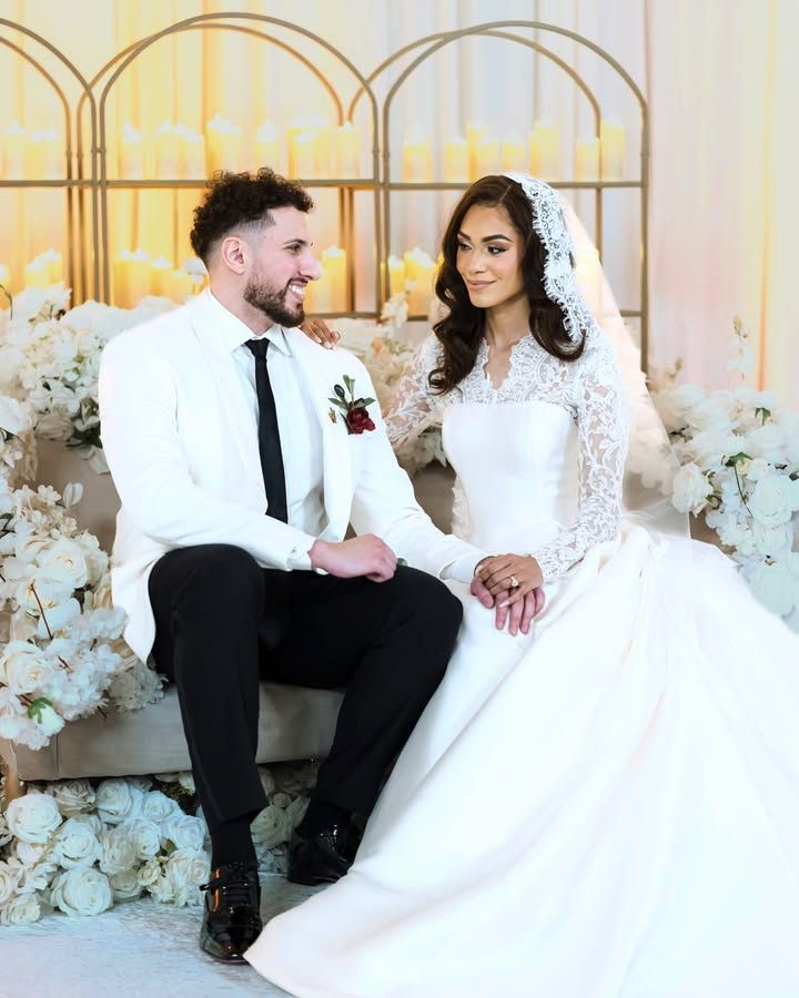 Romantic wedding couple in white dress and suit pose together against elegant floral backdrop in multiple candid shots.