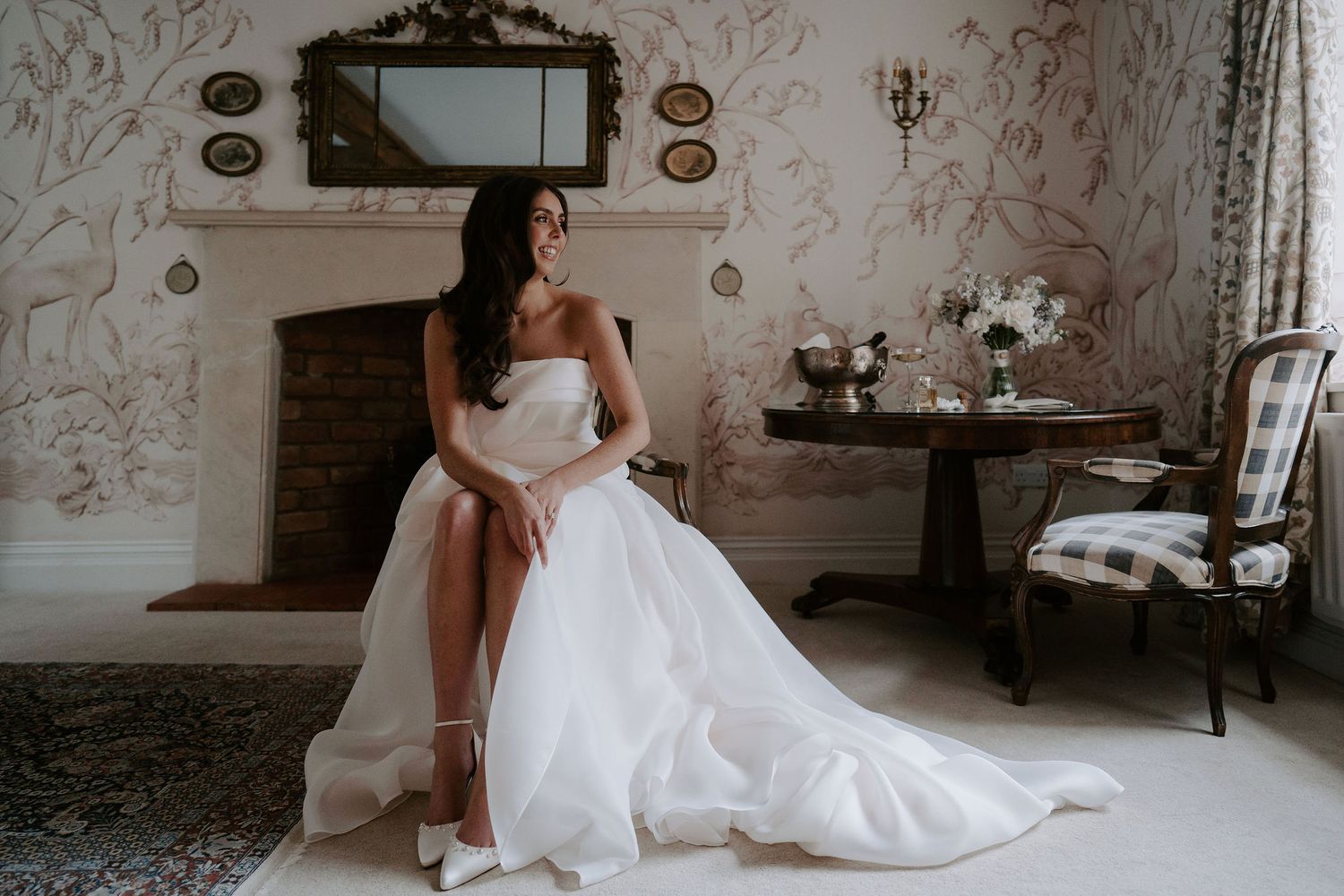 bride sat looking out window at dewsall court in herefordshire