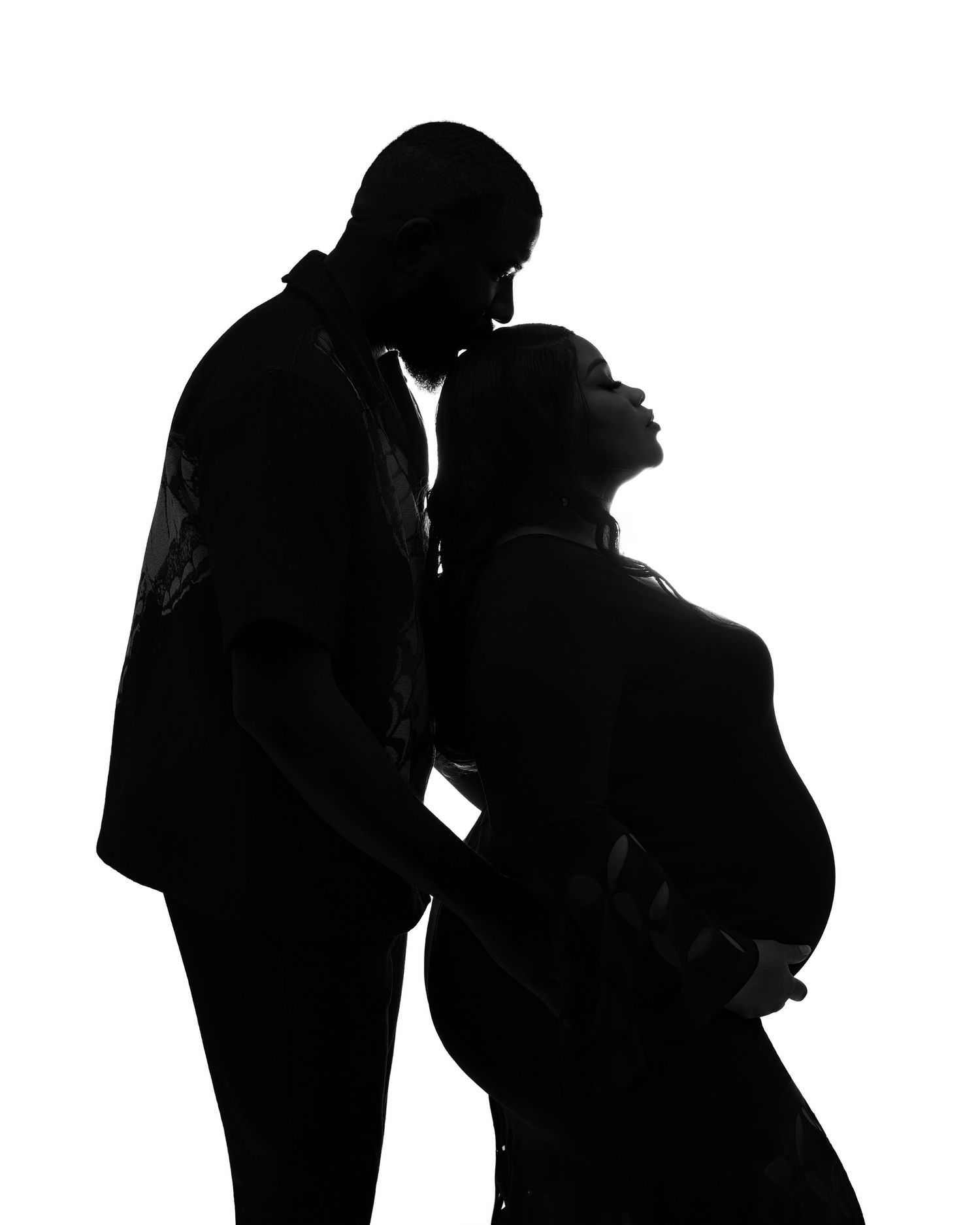 Black and white silhouettes of couples in various romantic poses.