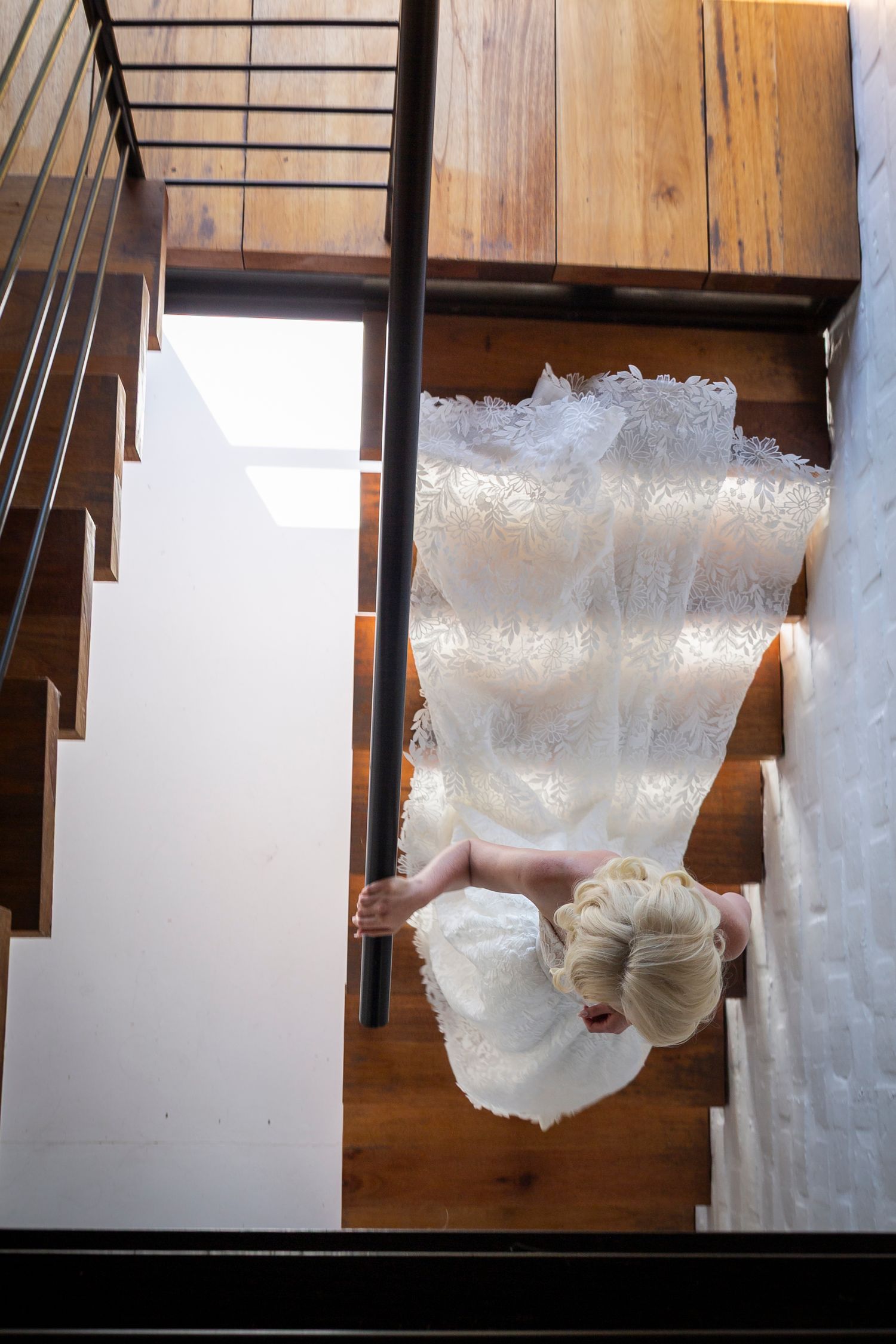 Time-lapse sequence showing a large ice crystal formation melting and dripping on a wooden surface.