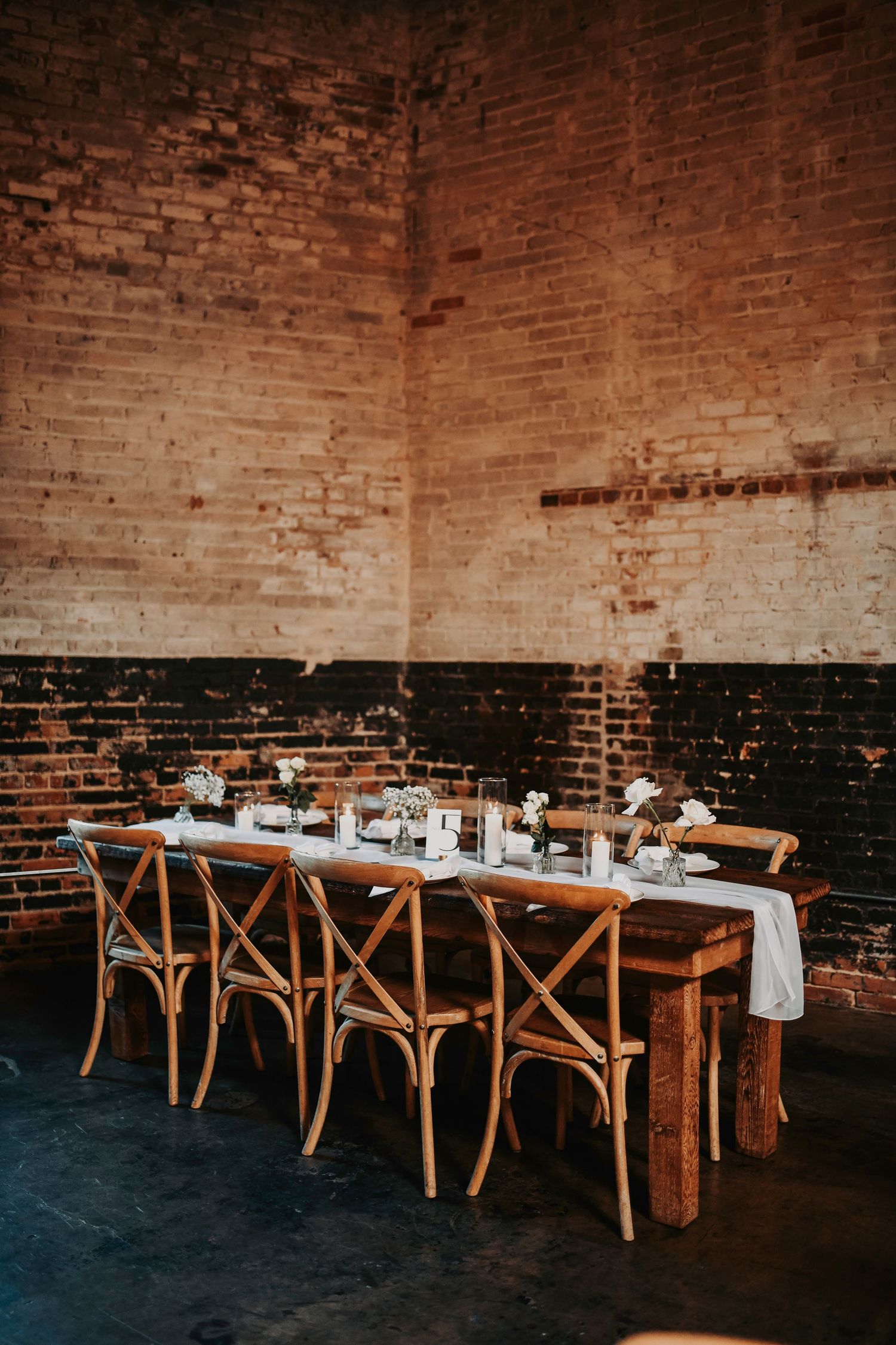 Reception tables styled with refined black-tie design