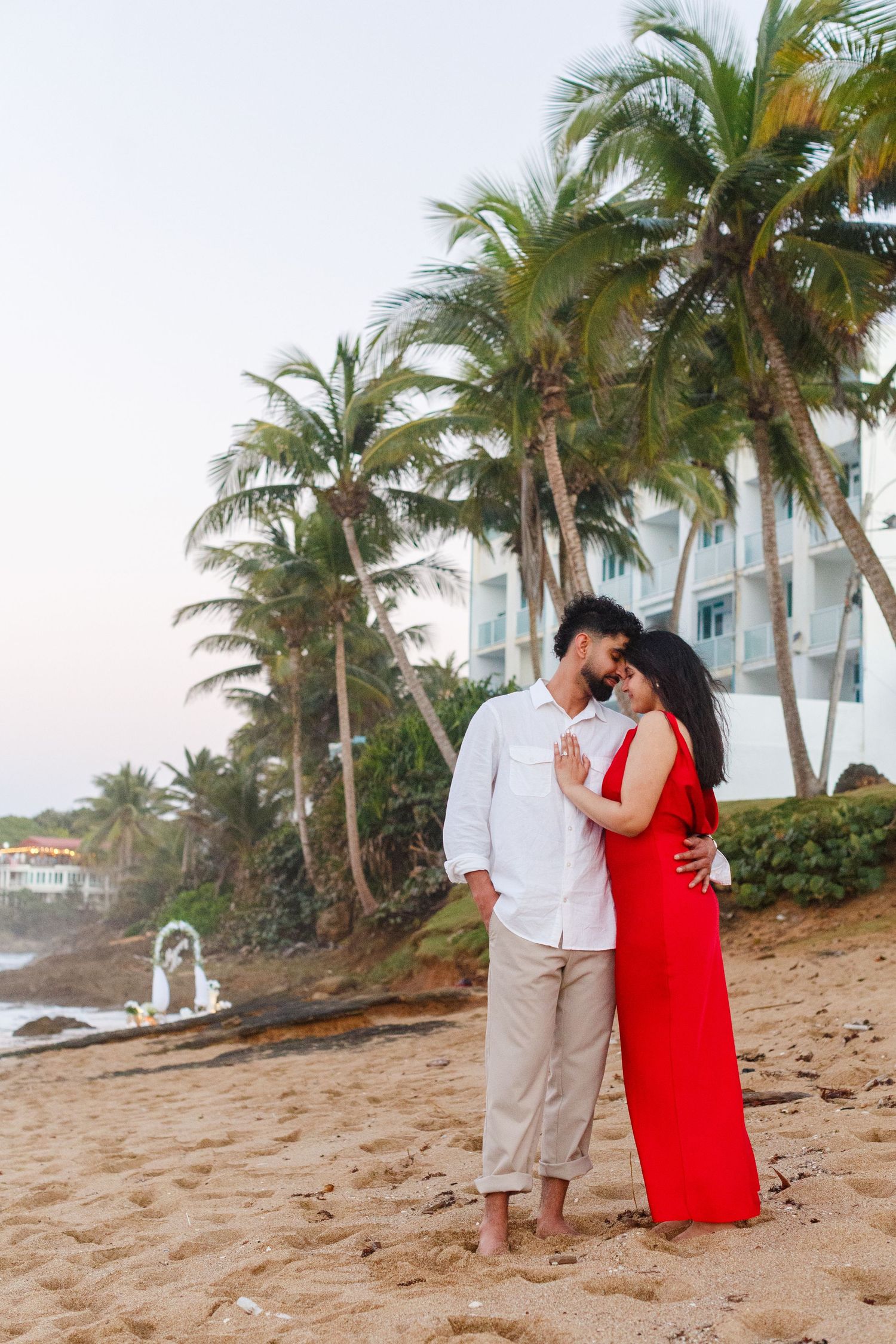 Couples portrait. Proposal and engagement session. Man and woman on the beach. Kikita Surf Beach, Dorado, Puerto Rico.