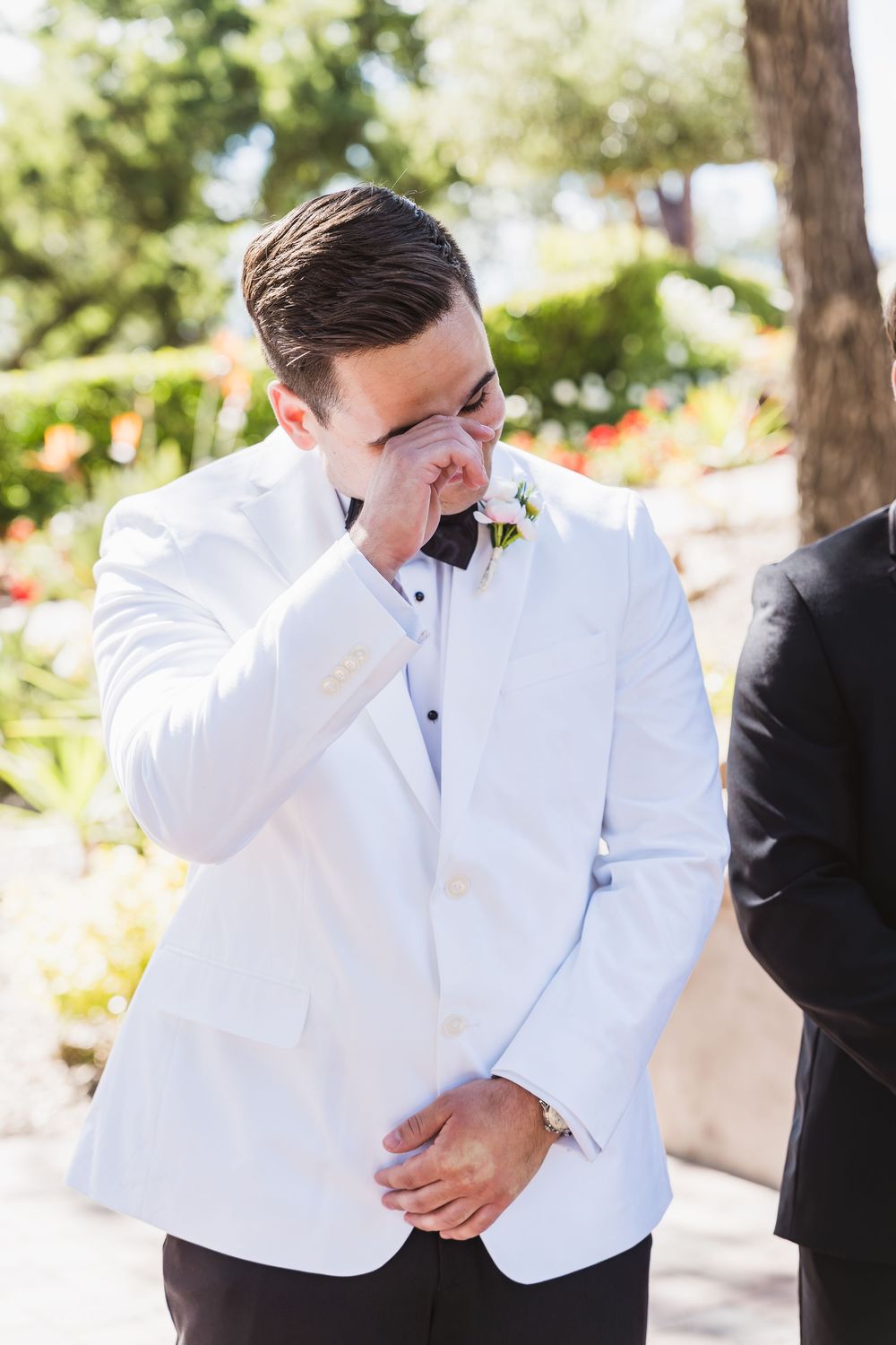 Emotional wedding moment captured in sequence showing reactions in white formal attire outdoors.