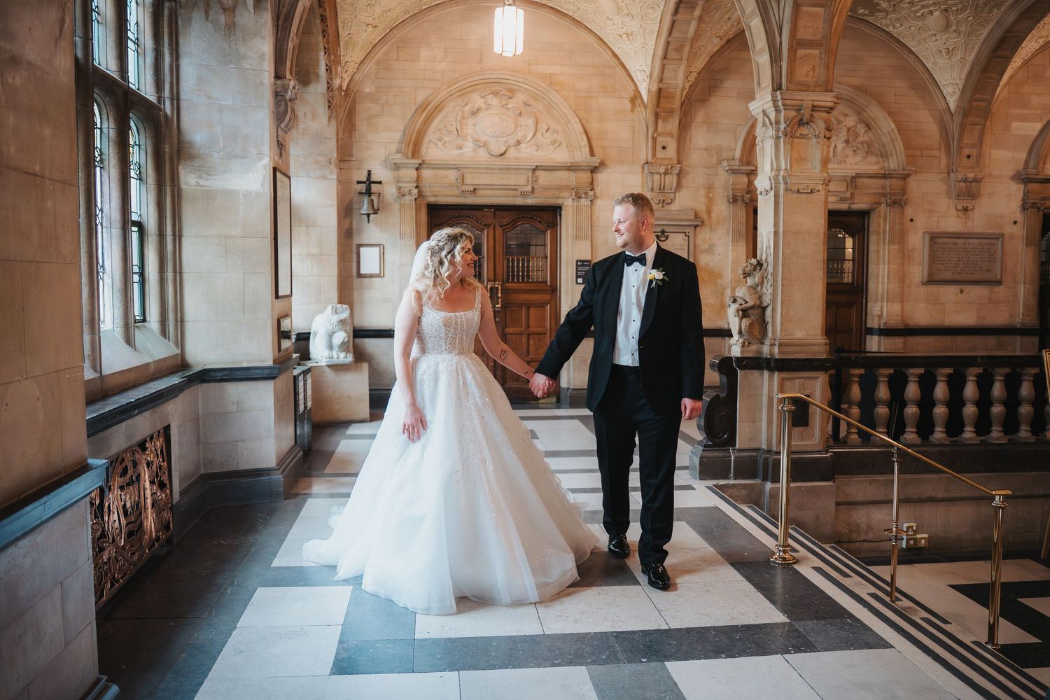 Oxford Town Hall Wedding Photography with Bride and Groom walking around the venue