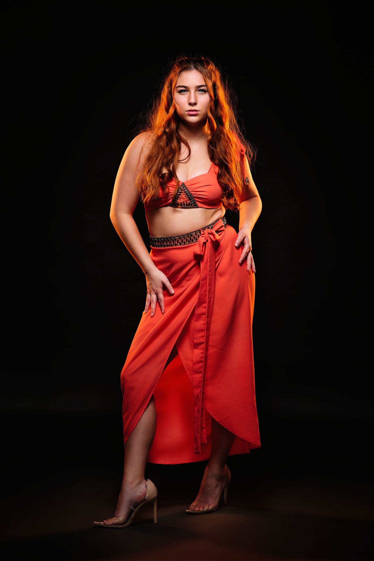 David G Holt Photography - Artistic fashion photos featuring red dress against dark background.