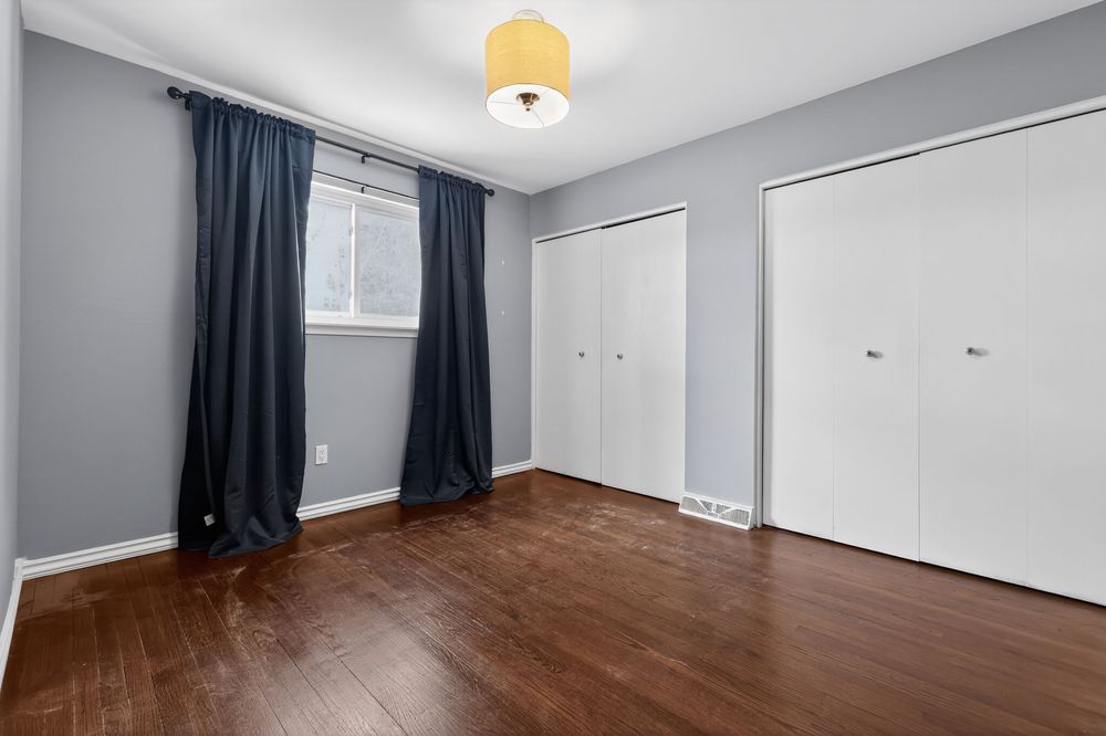 Professional real estate photography of a Bedroom in Madison Heights, Michigan