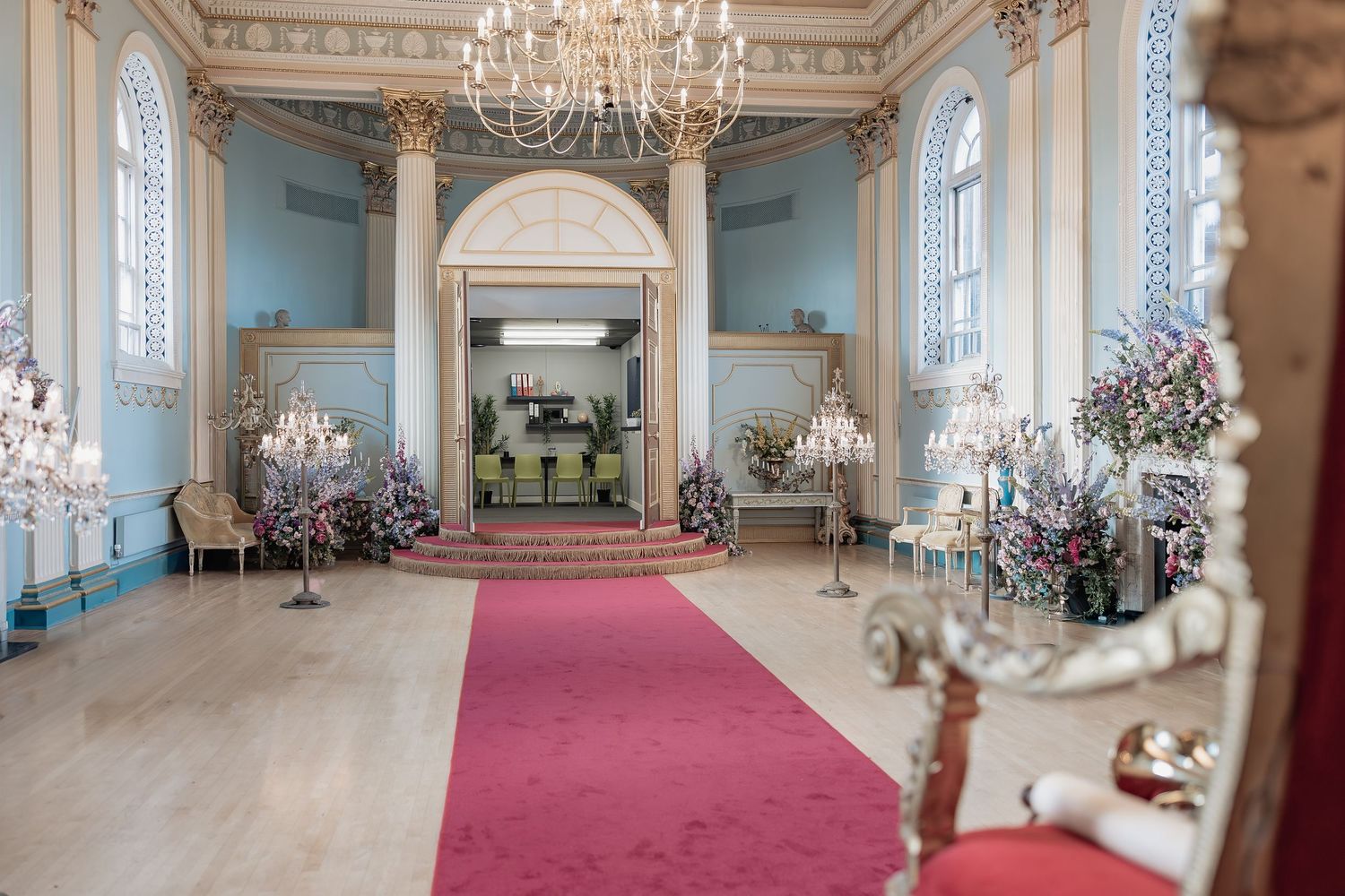 Behind the scenes of a Bridgerton Netflix filming setup at Newark Town Hall, showing the ballroom open floor after photoshop.