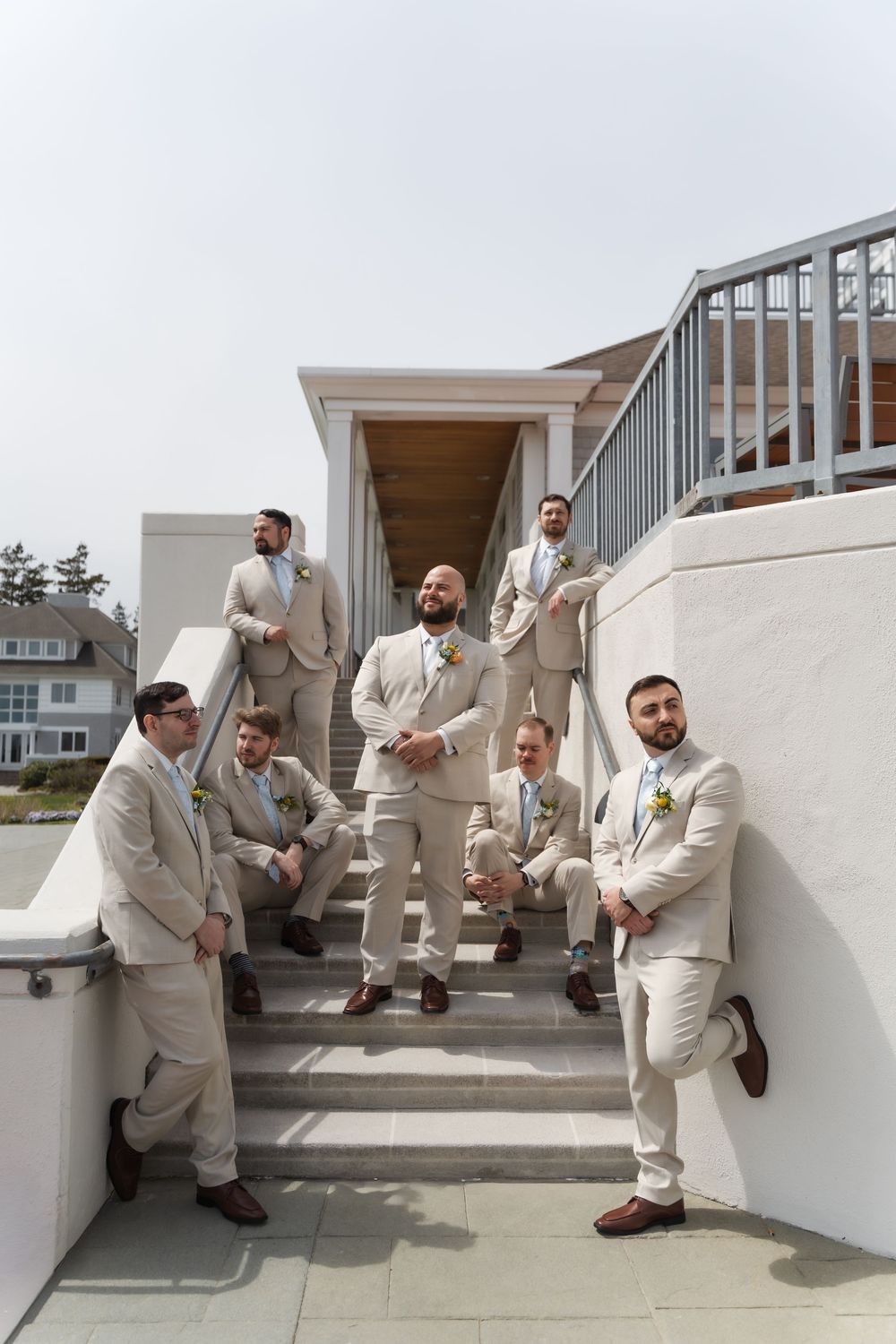 waters edge resort in connecticut groomsmen photos