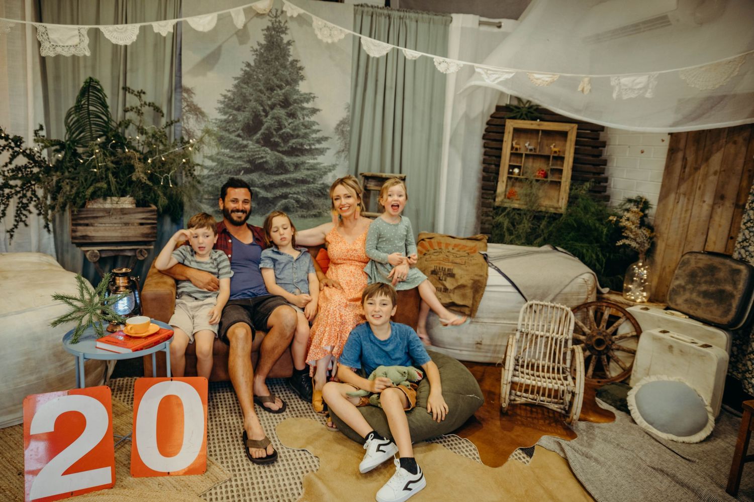 Kristielle Gibbons Photography with her family during her popular Christmas Portraits on set.