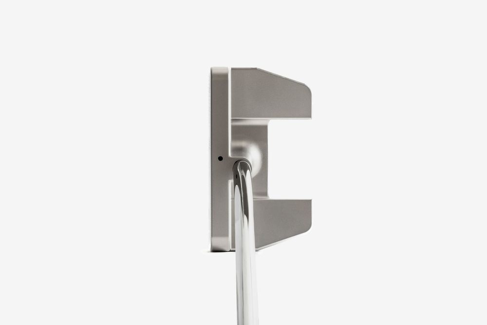 Silver mallet putter shown from the face-on angle, featuring a square head design with a white shaft on a white background.