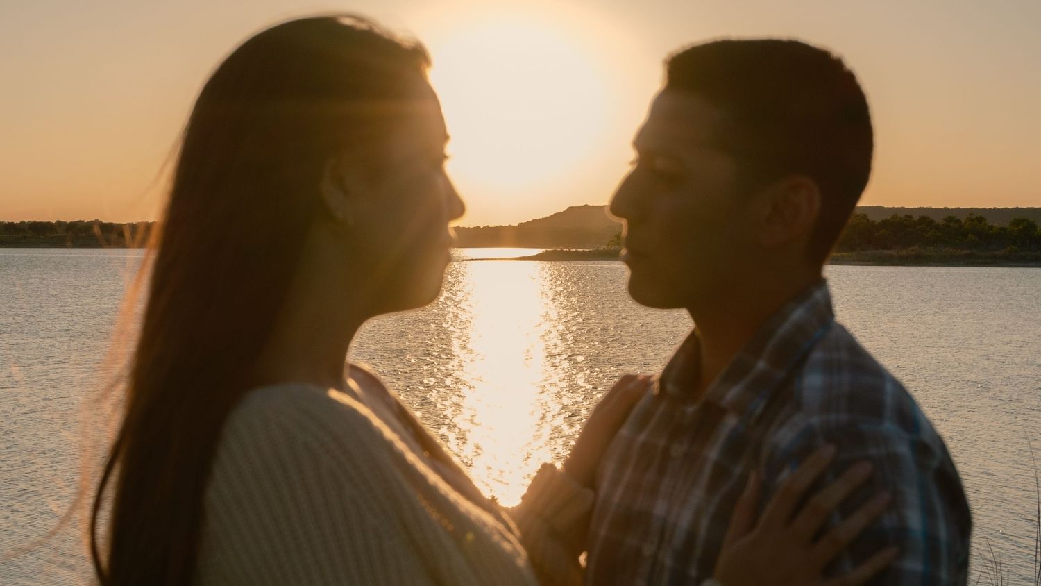 Romantic Sunset couples engagement photography session at Stillhouse lake in Belton Texas