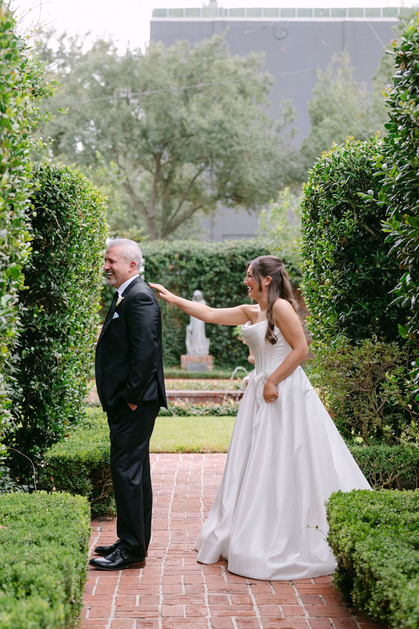 Emma and her father sharing a first look in the gardens.
