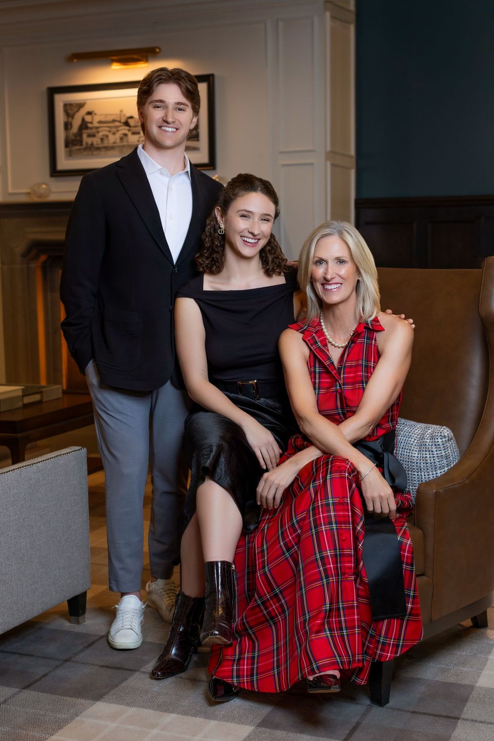Three candid shots show people sitting and posing together on a couch, with one wearing a red plaid dress.