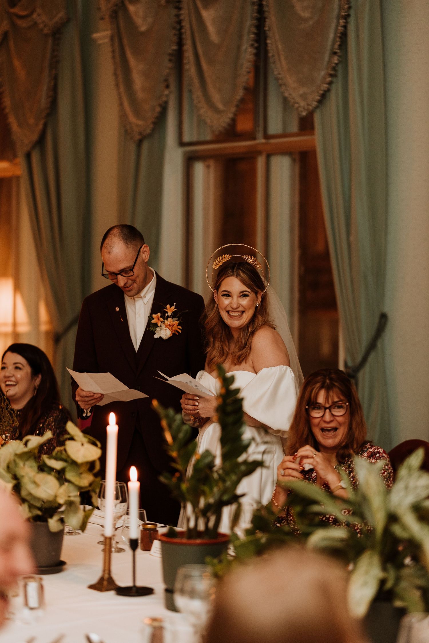 Couples joint speech at Randolph Hotel in Oxford for wedding breakfast