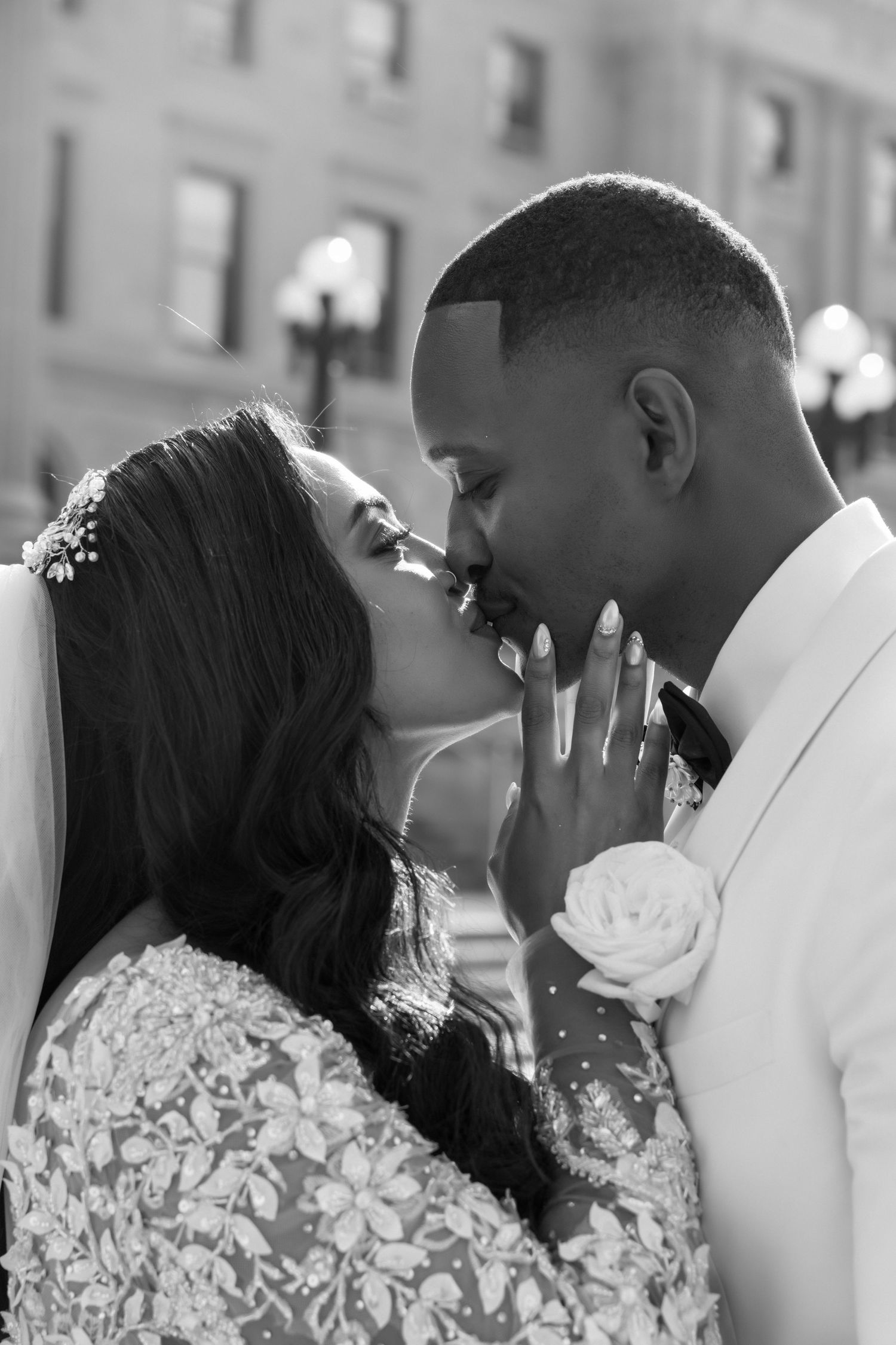 Romantic outdoor wedding portraits capturing tender moments between newlyweds.