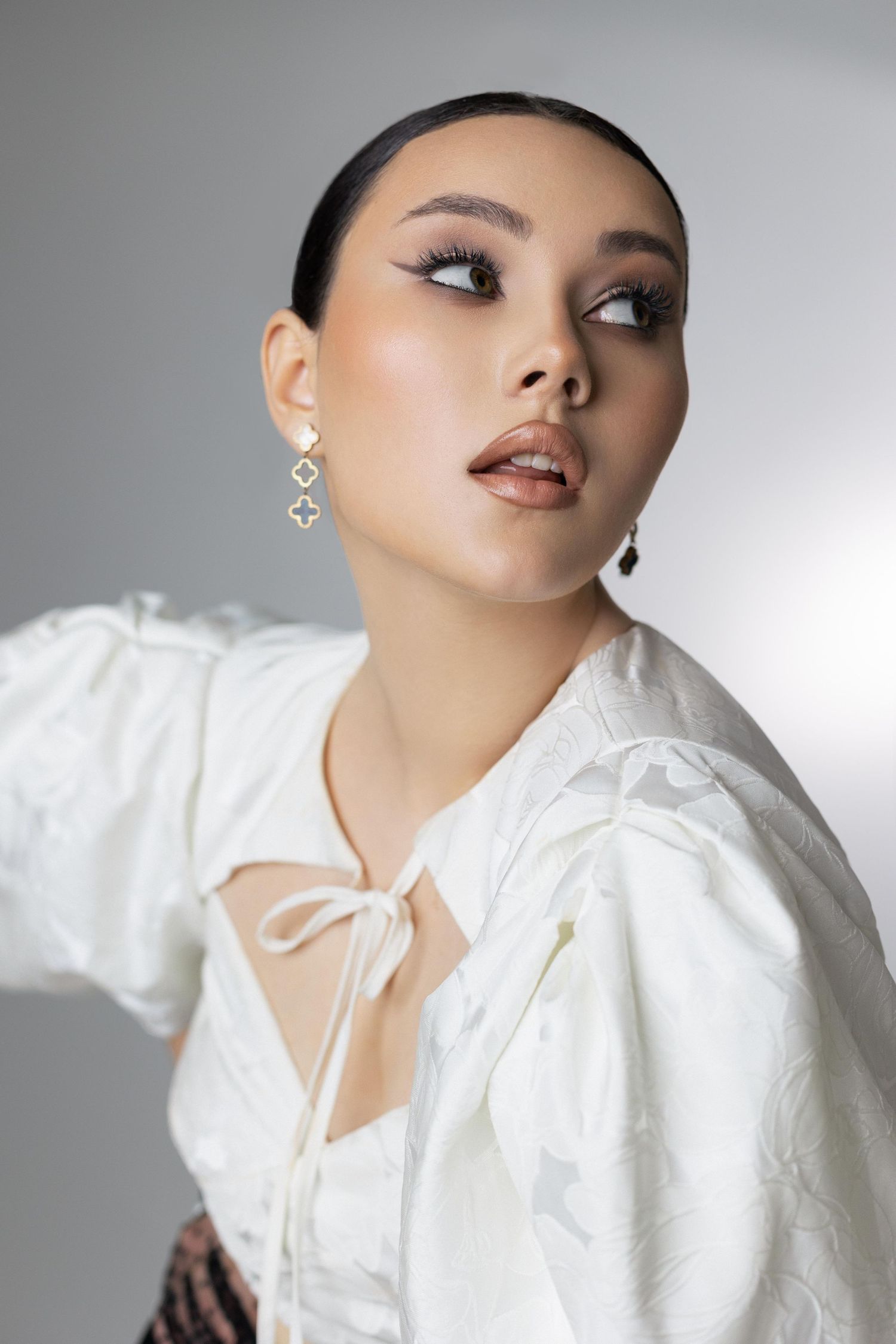Cambridge bridal makeup artist creating soft glam wedding look.