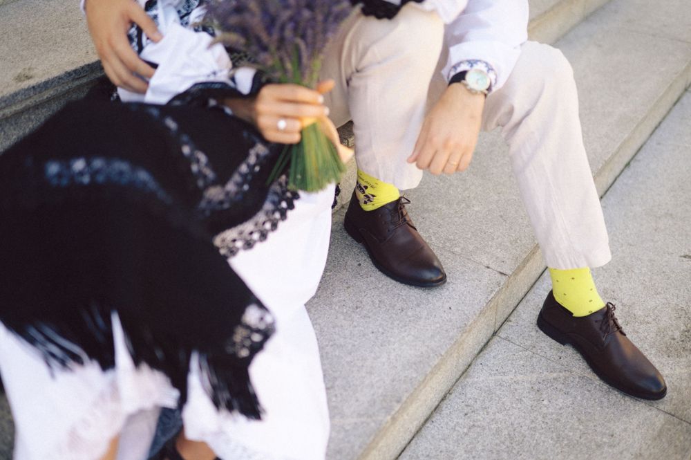 Detail shot of traditional Romanian clothing and bright yellow socks.