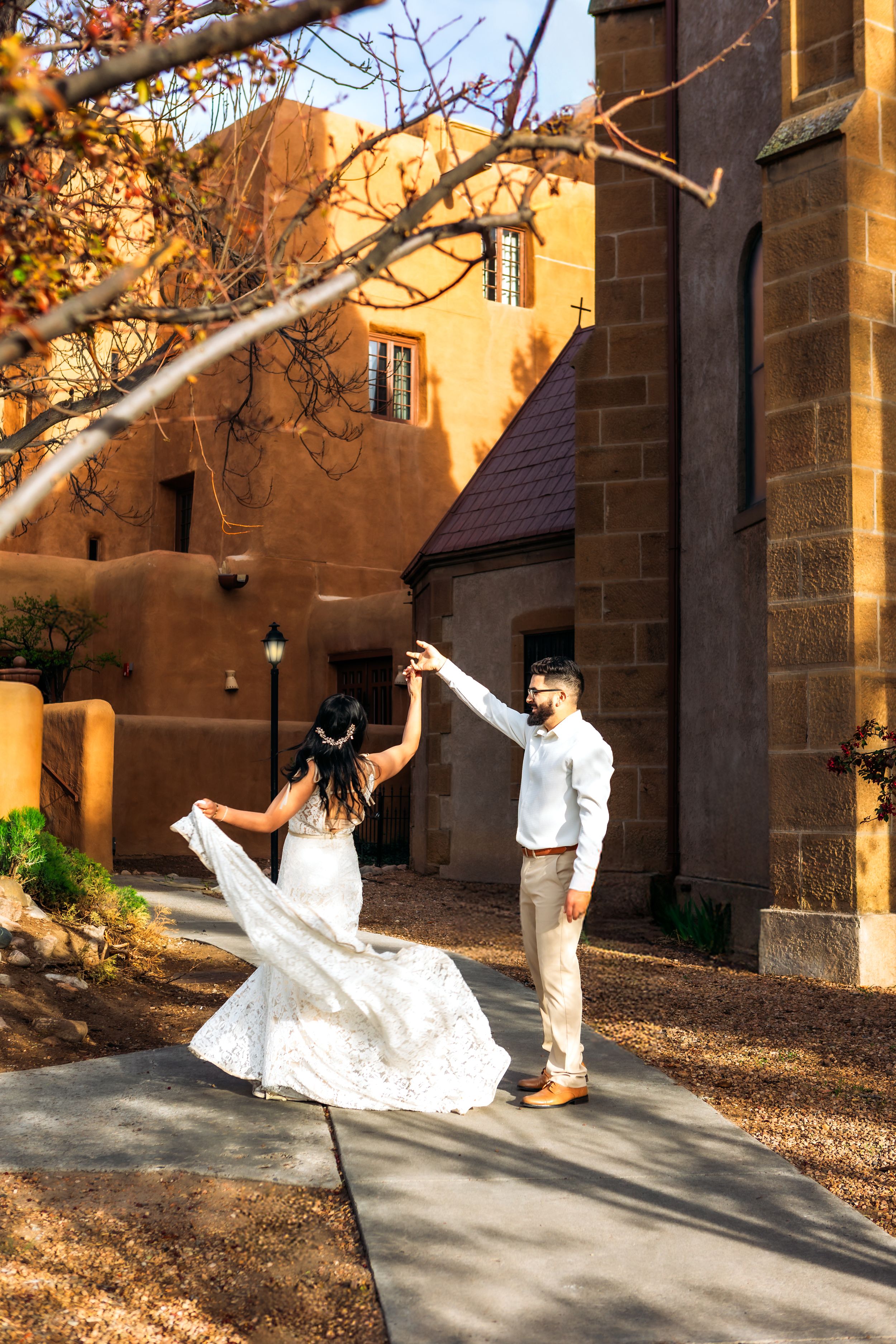 Four sequential images showing a marriage proposal moment with spinning motions against an adobe wall background at sunset.
