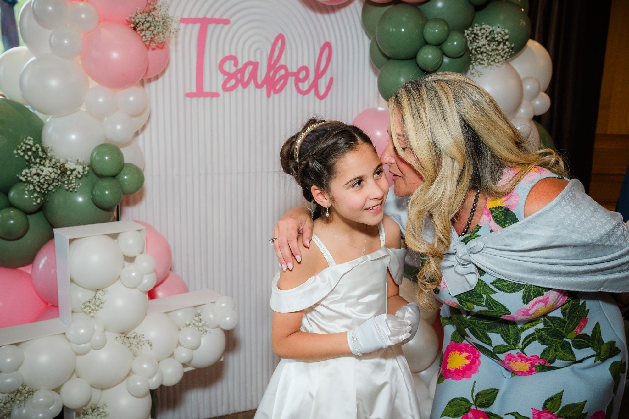 mother and daughter during the family photoshoot for the First communion celebration at Magna golf club in Newmarket