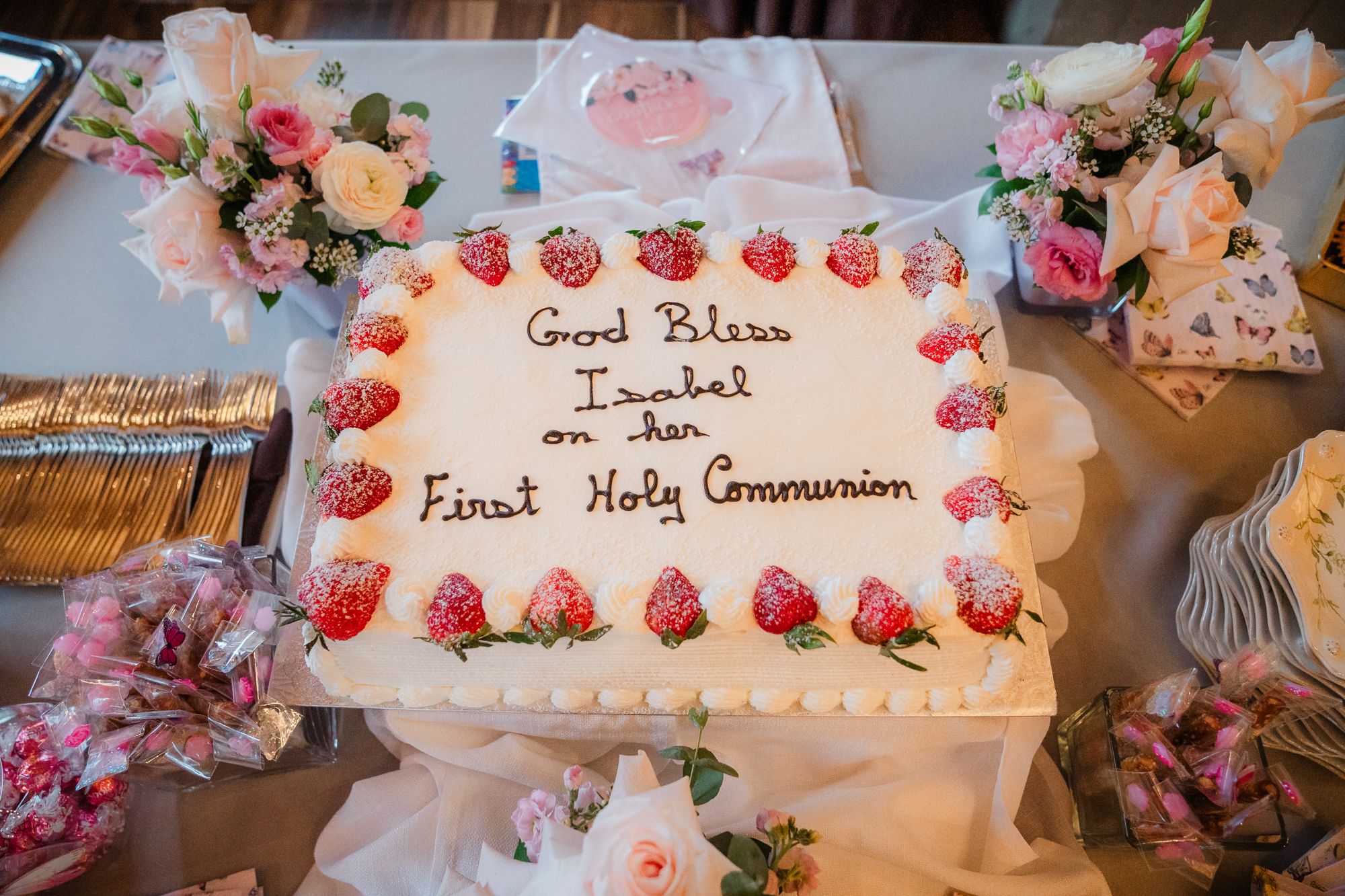First Communion cake for the celebration during the event photography at Magna golf club in Newmarket, Ontario