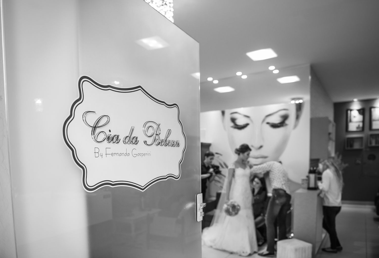 Black and white image of a bridal salon storefront with elegant signage.