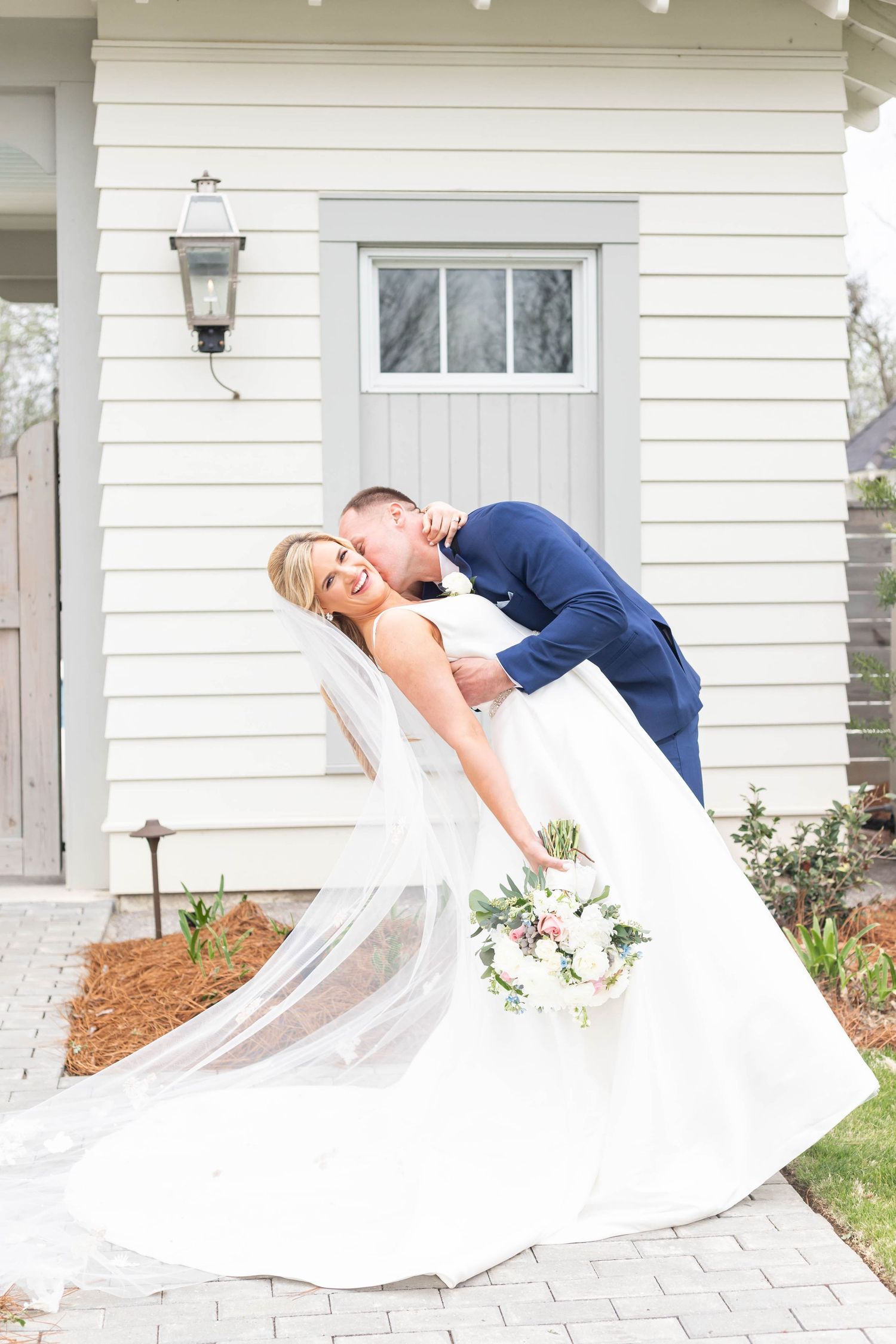 bride and groom kiss